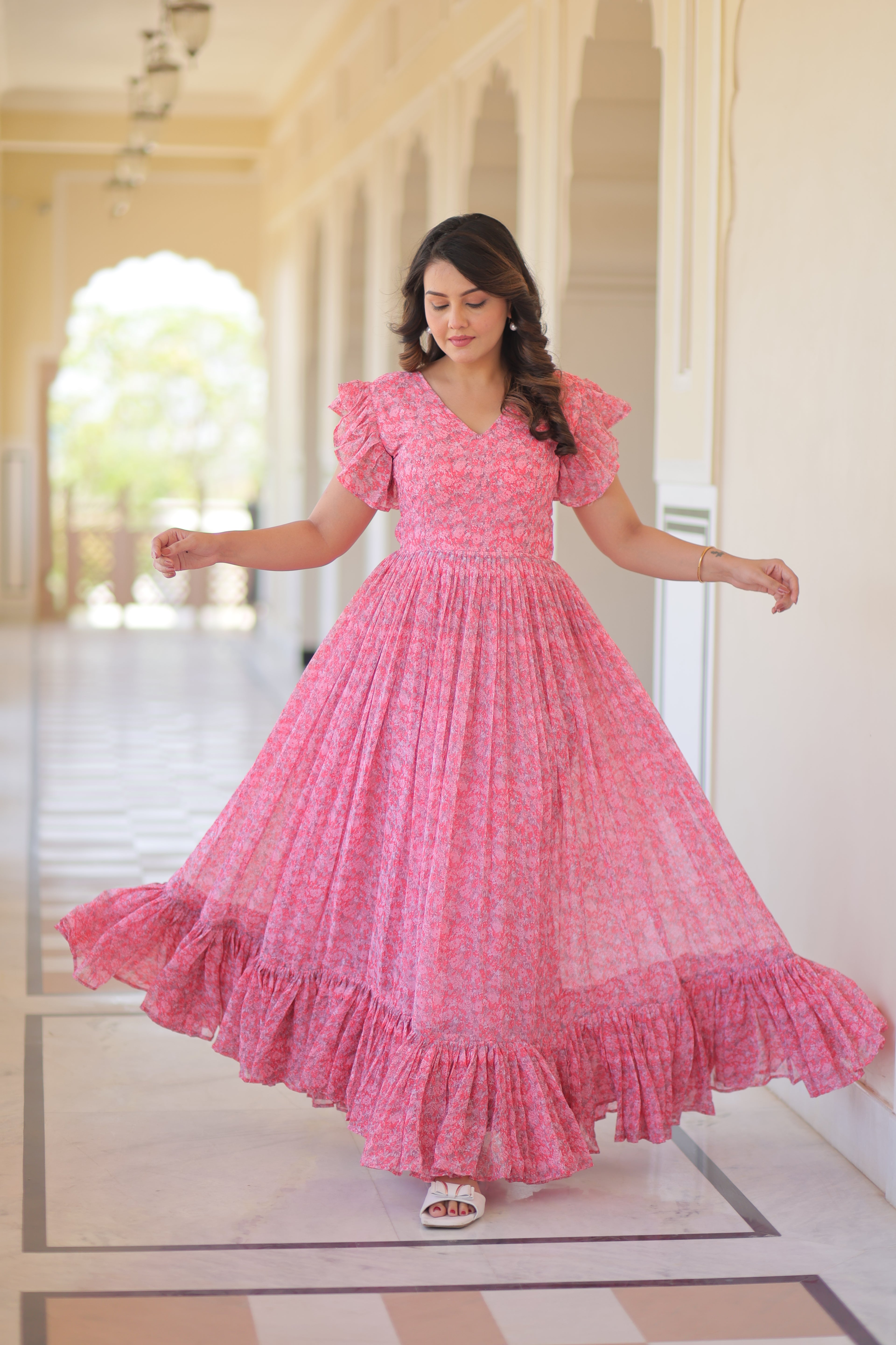 Faux Georgette Printed Pink Gown with Bell Sleeves | 7 Mtr Flair | Fancy V Neck | Full Stitched