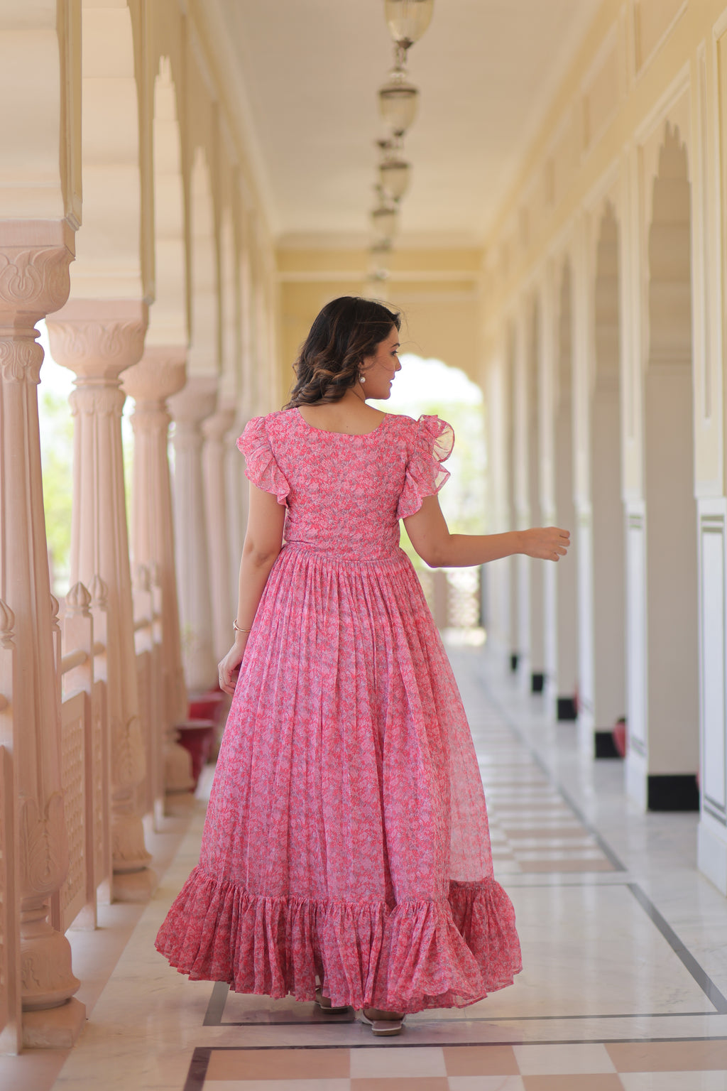 Faux Georgette Printed Pink Gown with Bell Sleeves | 7 Mtr Flair | Fancy V Neck | Full Stitched