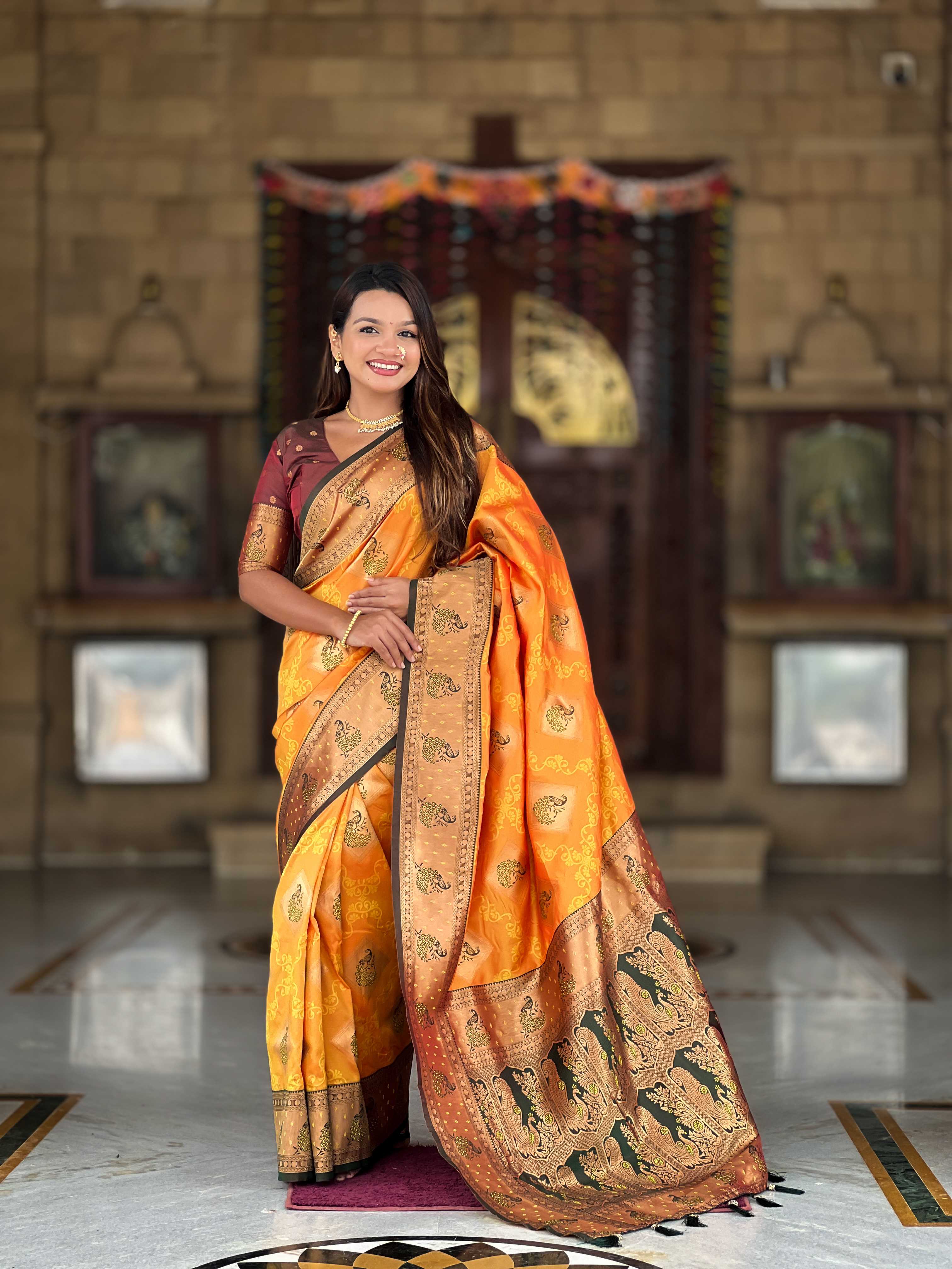 Orange Soft Banarasi silk saree with zari weaving Meenakari design all over the saree & contrast weawing Rich pallu with contrast weawing border & tessels attached at Pallu End. Blouse :- Soft silk weawing blouse piece