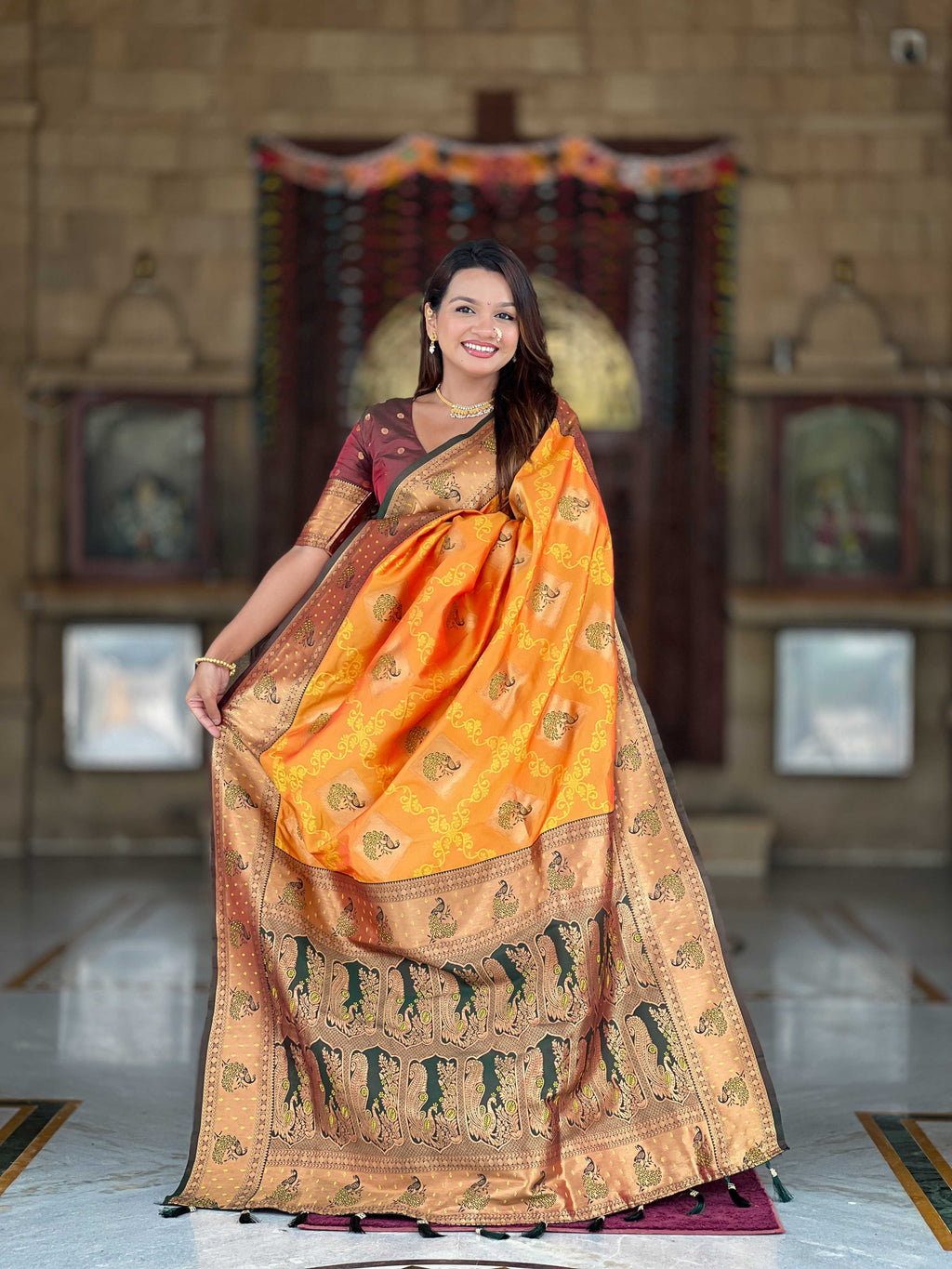 Orange Soft Banarasi silk saree with zari weaving Meenakari design all over the saree & contrast weawing Rich pallu with contrast weawing border & tessels attached at Pallu End. Blouse :- Soft silk weawing blouse piece
