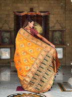 Orange Soft Banarasi silk saree with zari weaving Meenakari design all over the saree & contrast weawing Rich pallu with contrast weawing border & tessels attached at Pallu End. Blouse :- Soft silk weawing blouse piece