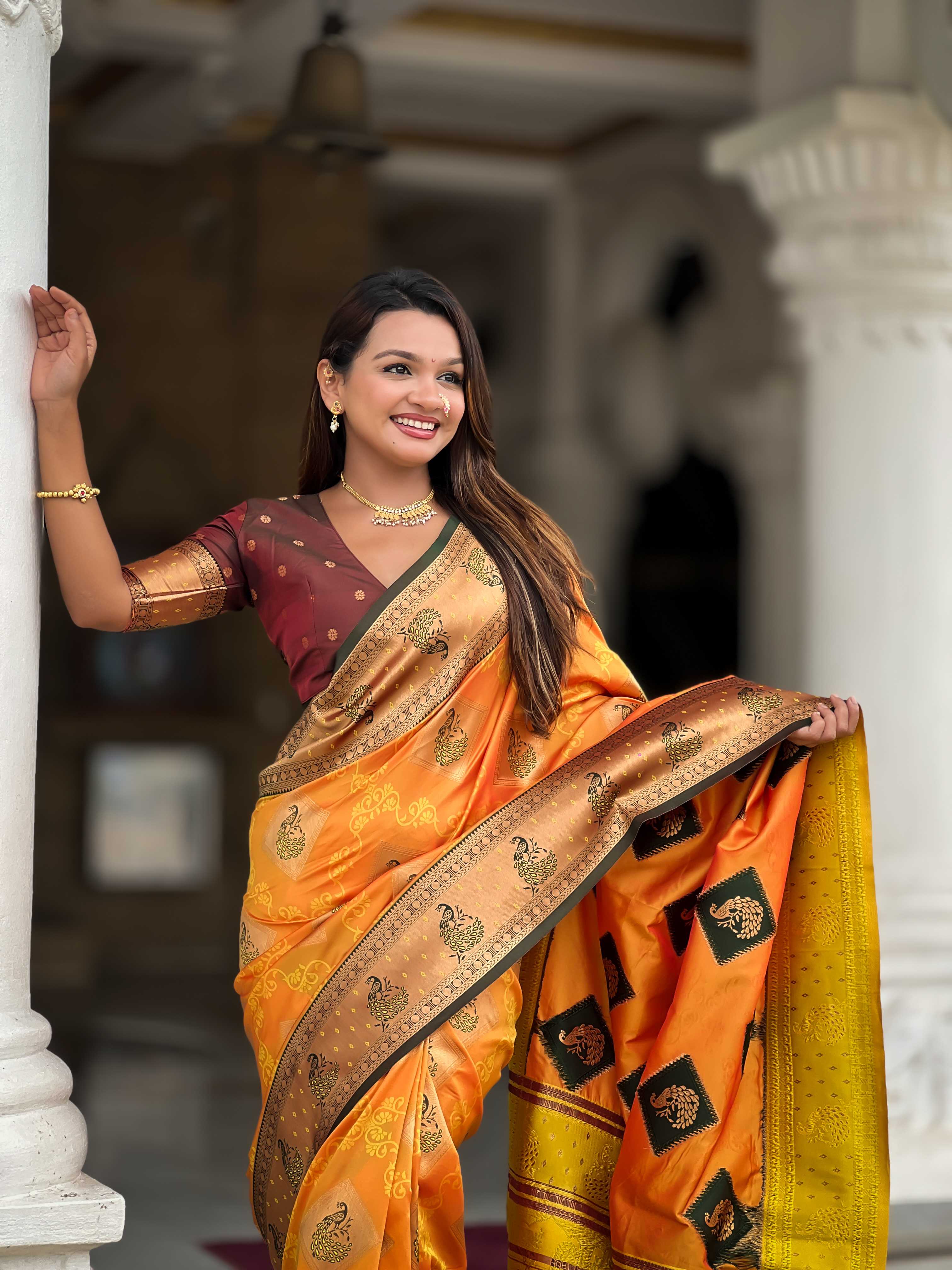 Orange Soft Banarasi silk saree with zari weaving Meenakari design all over the saree & contrast weawing Rich pallu with contrast weawing border & tessels attached at Pallu End. Blouse :- Soft silk weawing blouse piece