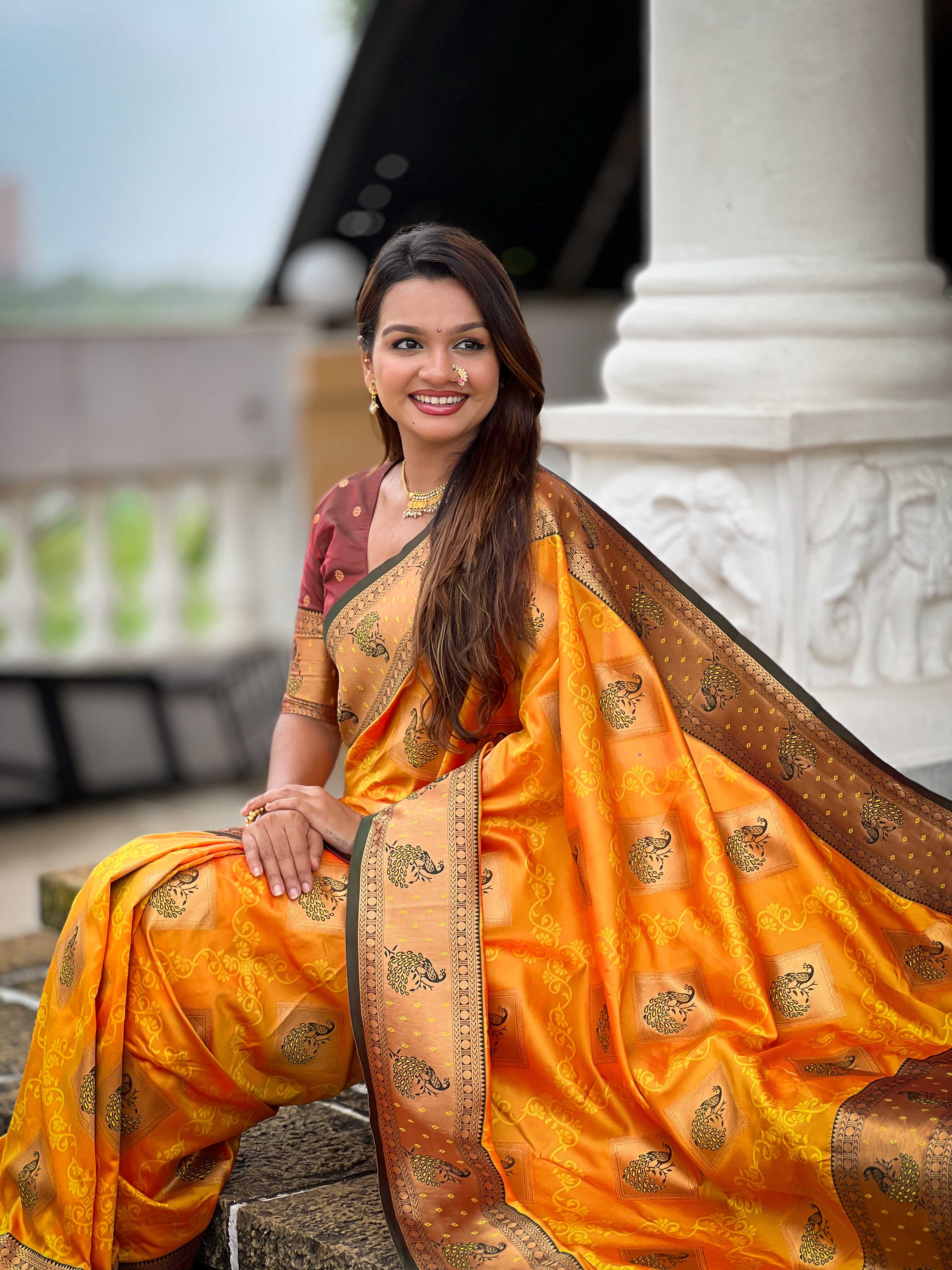 Orange Soft Banarasi silk saree with zari weaving Meenakari design all over the saree & contrast weawing Rich pallu with contrast weawing border & tessels attached at Pallu End. Blouse :- Soft silk weawing blouse piece