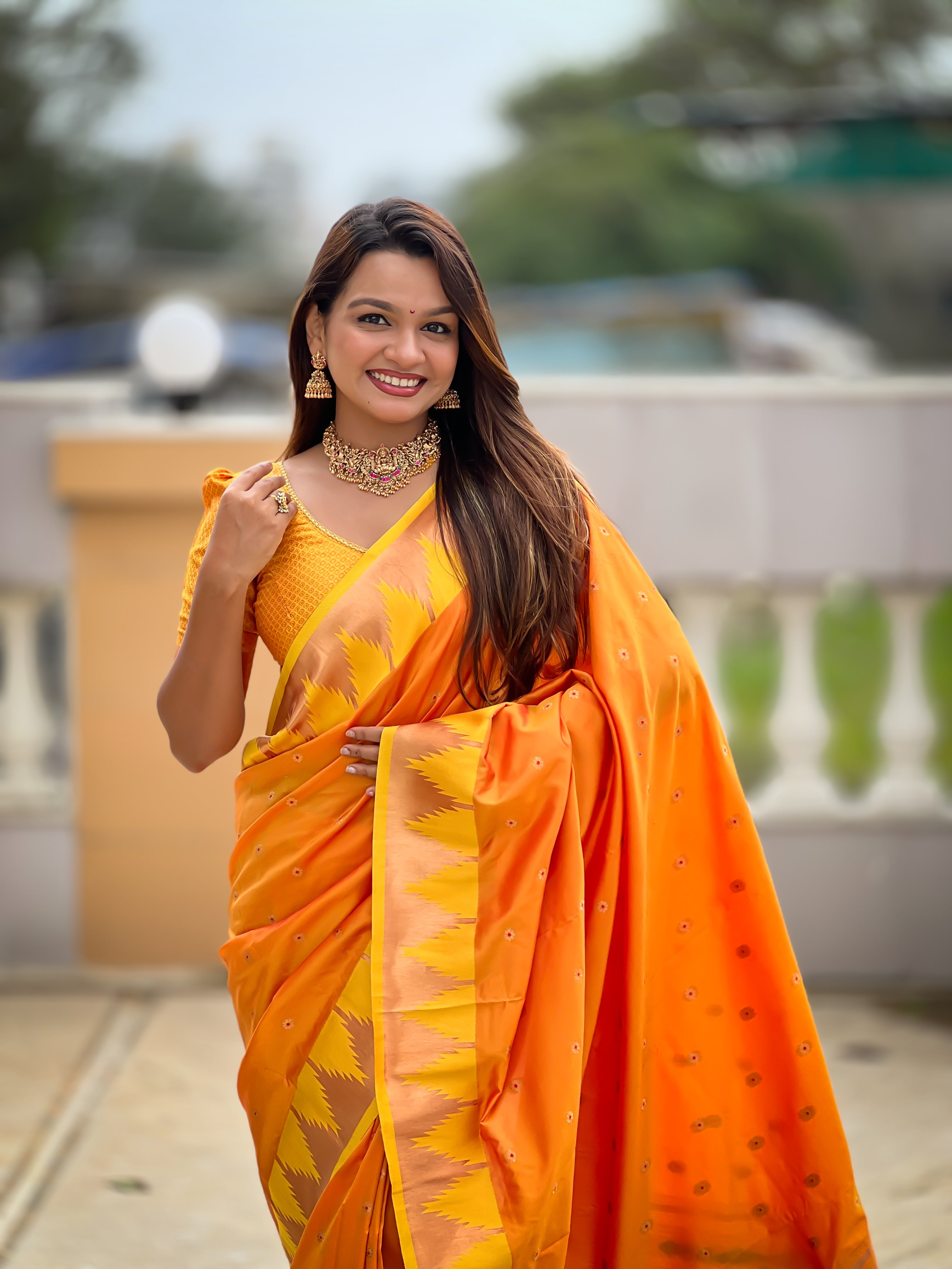 Orange Paithani Silk Saree with Meenakari Rich Pallu & Temple Weaving Border