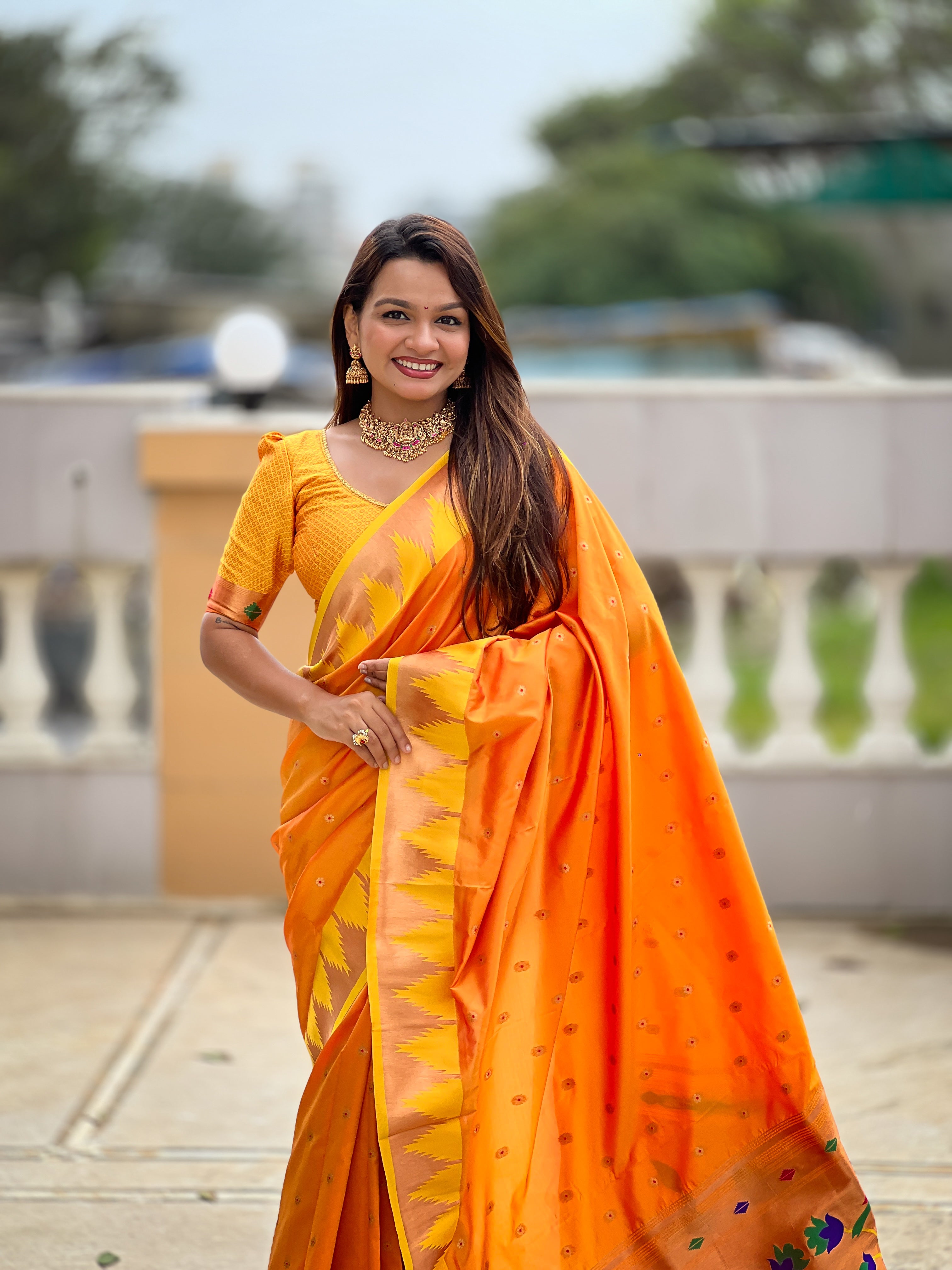 Orange Paithani Silk Saree with Meenakari Rich Pallu & Temple Weaving Border