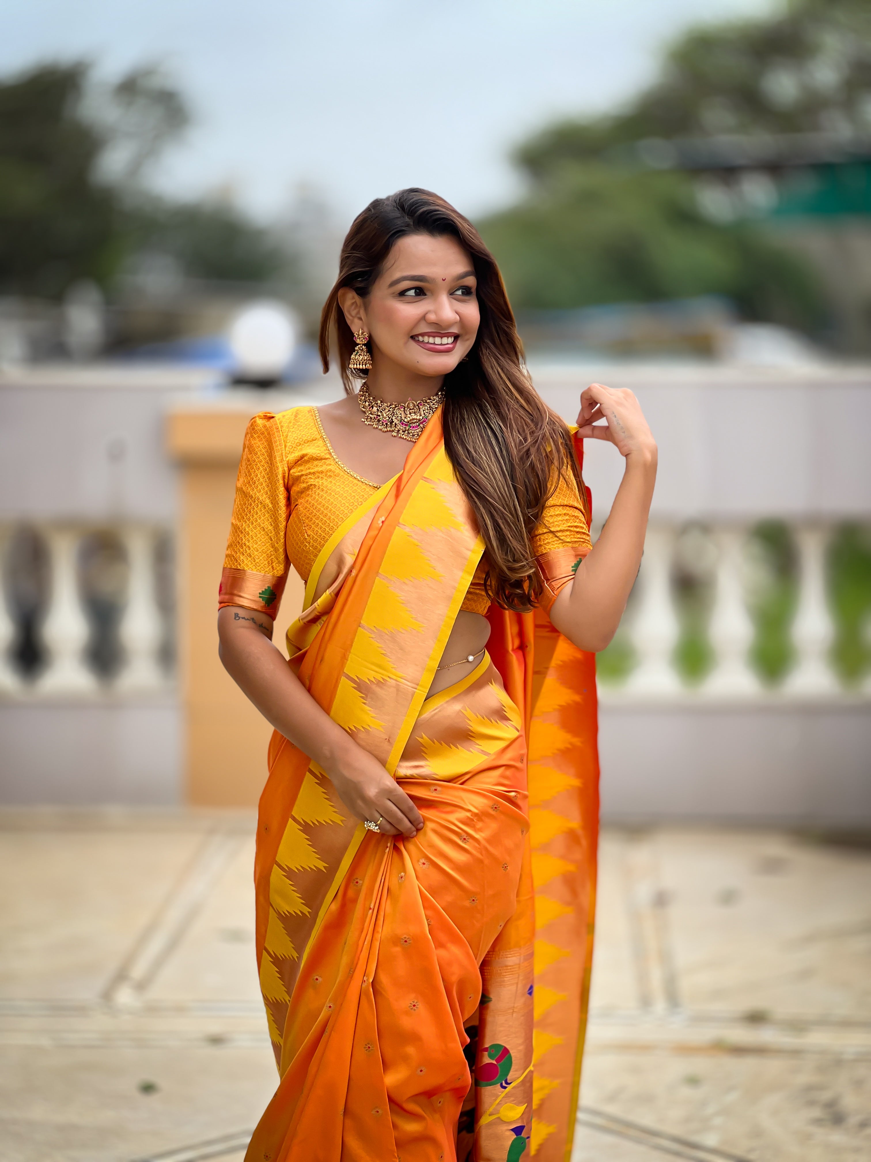 Orange Paithani Silk Saree with Meenakari Rich Pallu & Temple Weaving Border
