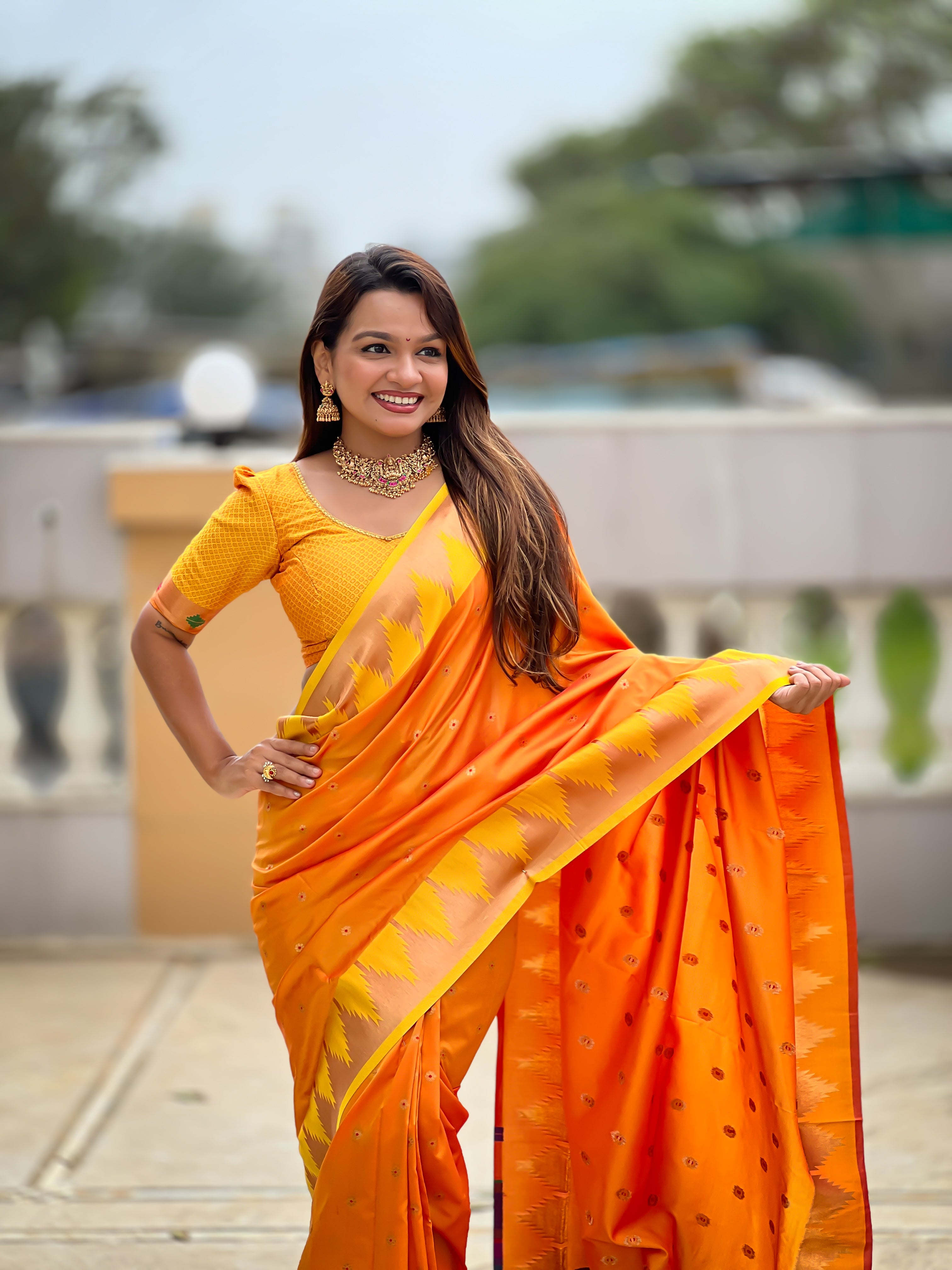 Orange Paithani Silk Saree with Meenakari Rich Pallu & Temple Weaving Border