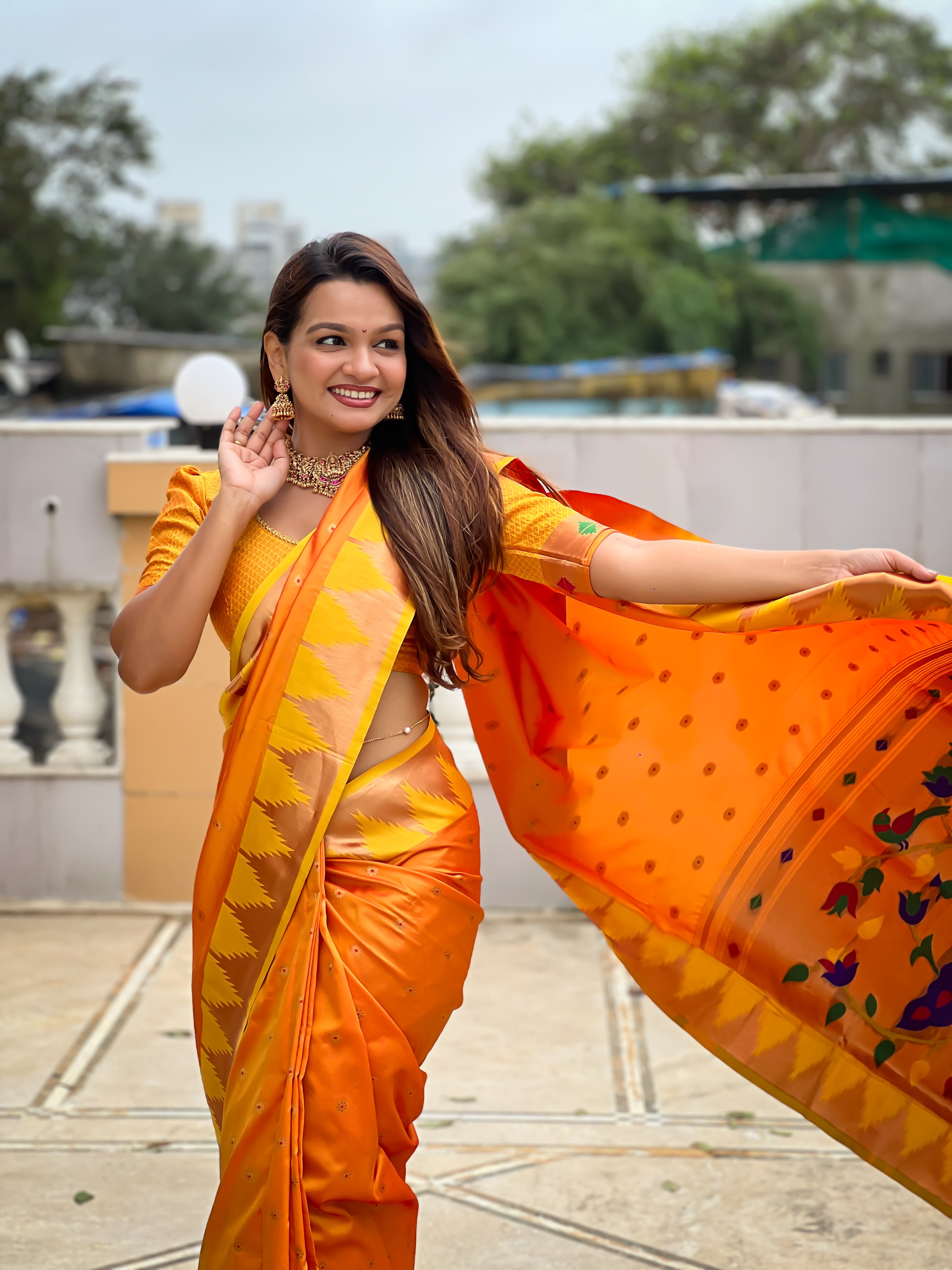 Orange Paithani Silk Saree with Meenakari Rich Pallu & Temple Weaving Border
