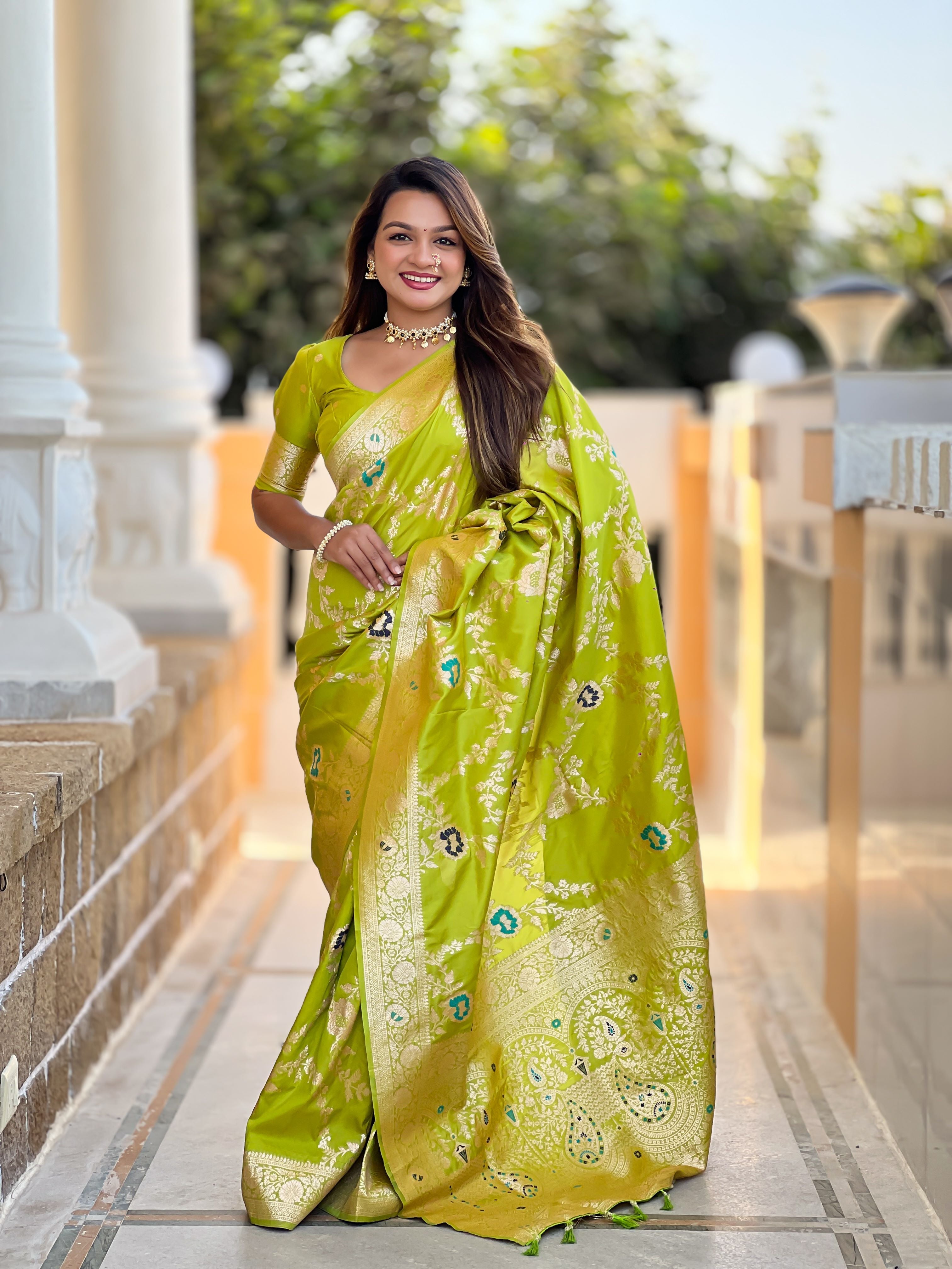 Parrot Varni Fabrics Women Floral Banarasi Silk Woven Saree comes With Matching Blouse
