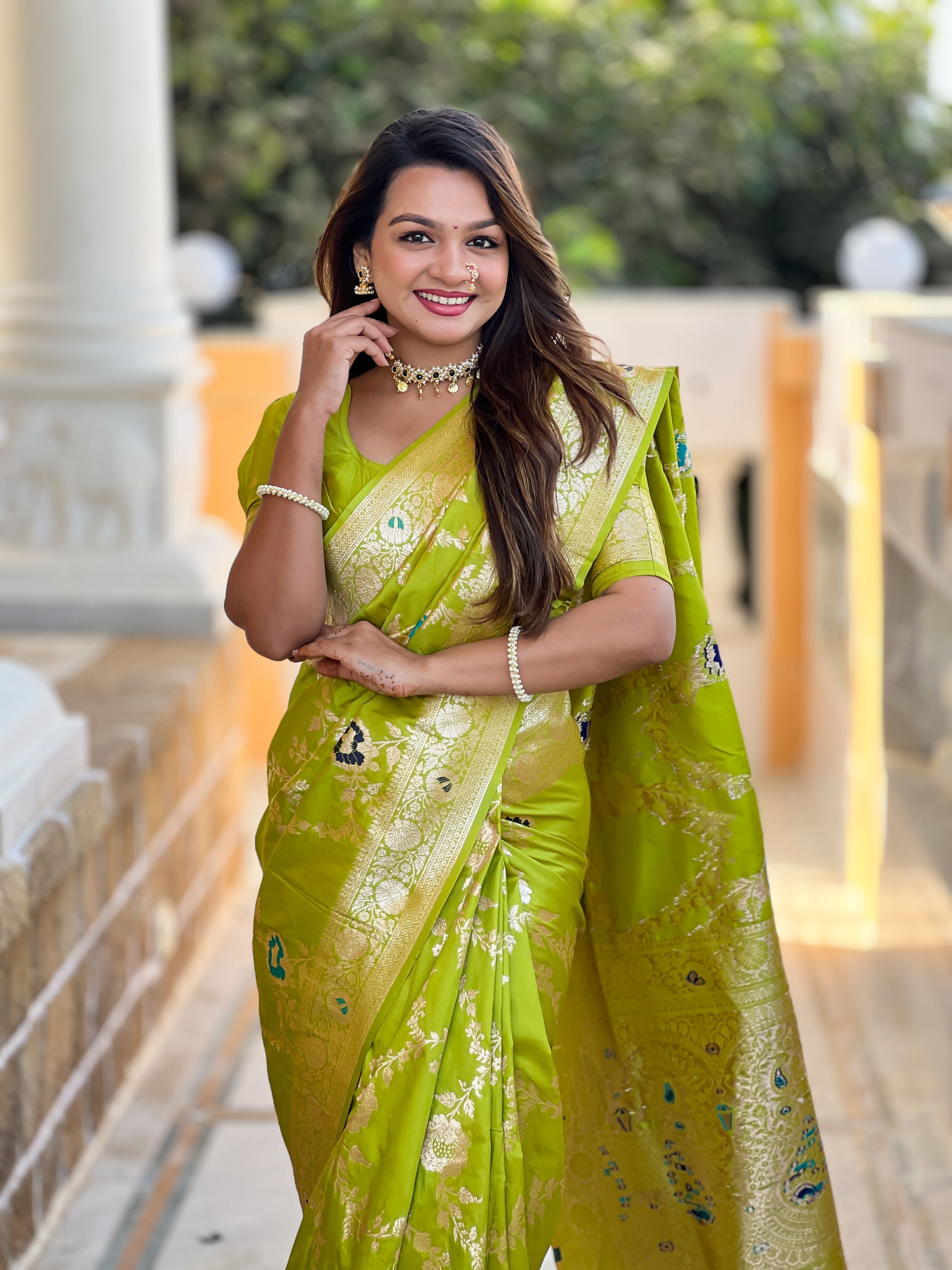 Parrot Varni Fabrics Women Floral Banarasi Silk Woven Saree comes With Matching Blouse