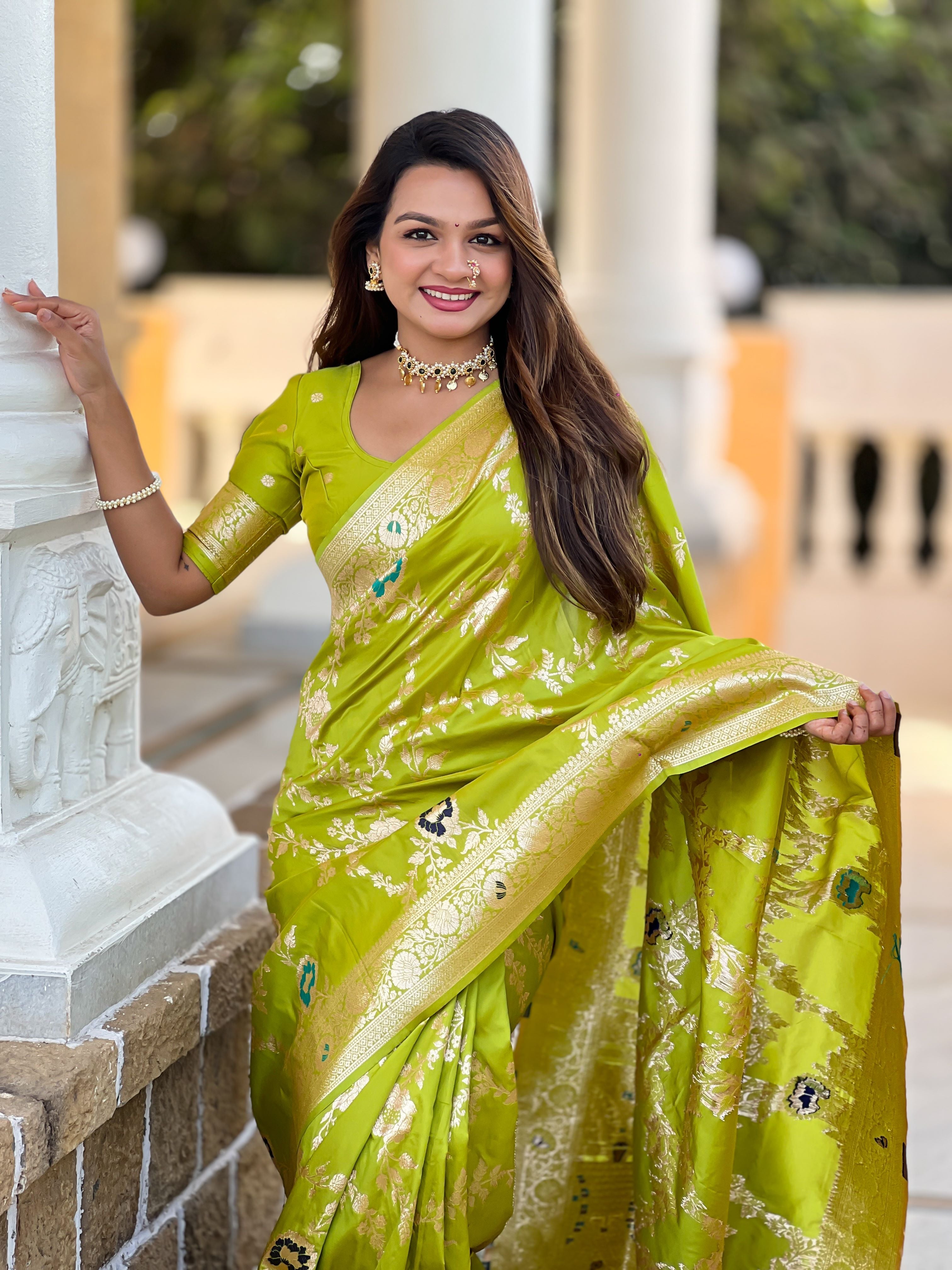 Parrot Varni Fabrics Women Floral Banarasi Silk Woven Saree comes With Matching Blouse