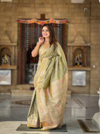 Pista Varni Fabrics Women Paisley Banarasi Silk Embellished Saree comes With Matching Blouse