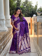 Purple Varni Fabrics Women Anjir Geometric Banarasi Silk Tassels and Latkans Saree comes With Matching Blouse