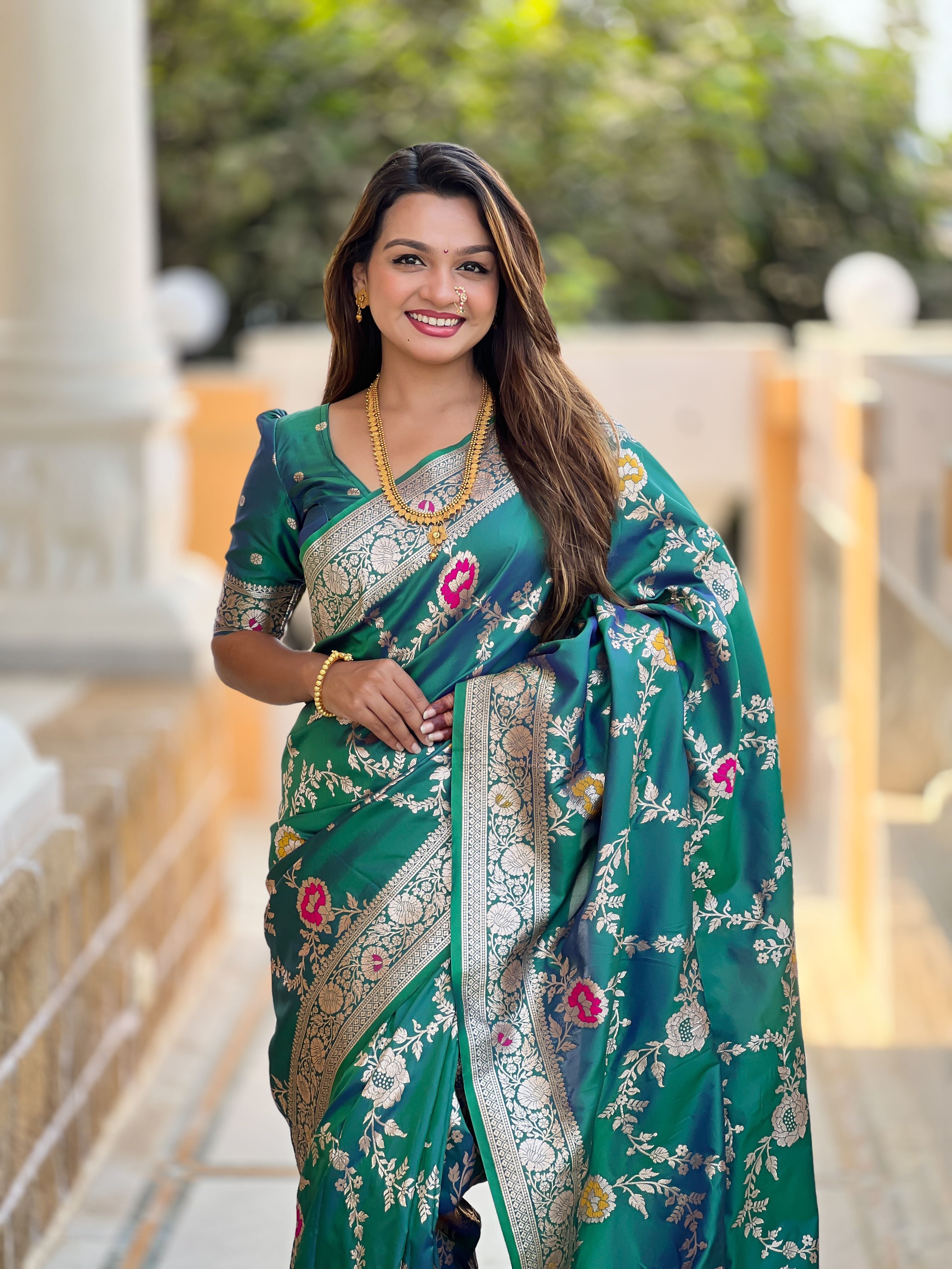Rama Varni Fabrics Women Floral Banarasi Silk Woven Saree comes With Matching Blouse