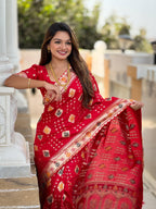 Red Varni Fabrics Women Floral Dolla Silk Tassels and Latkans Saree comes With Matching Blouse