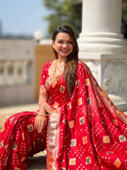 Red Varni Fabrics Women Floral Dolla Silk Tassels and Latkans Saree comes With Matching Blouse