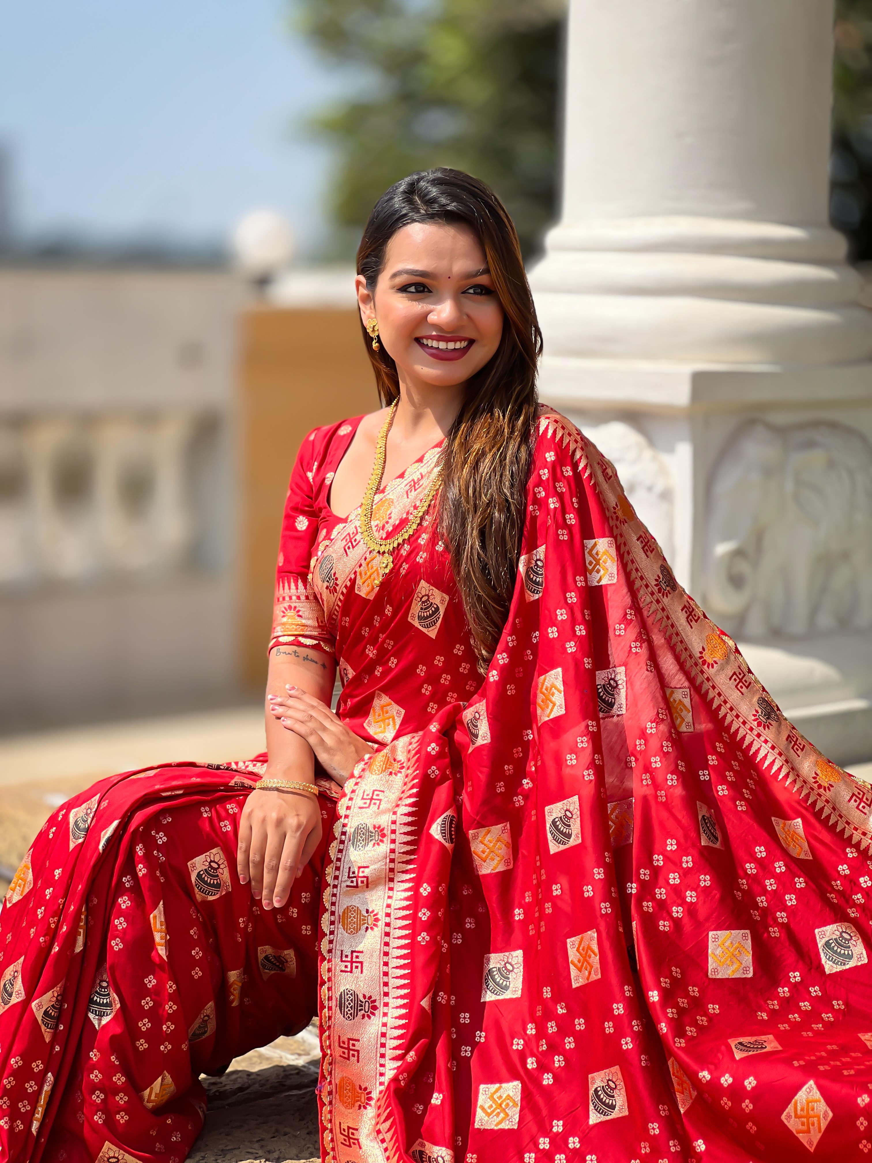 Red Varni Fabrics Women Floral Dolla Silk Tassels and Latkans Saree comes With Matching Blouse