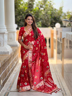 Red Varni Fabrics Women Floral Dolla Silk Tassels and Latkans Saree comes With Matching Blouse
