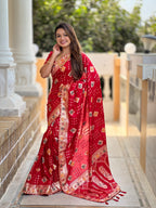 Red Varni Fabrics Women Floral Dolla Silk Tassels and Latkans Saree comes With Matching Blouse