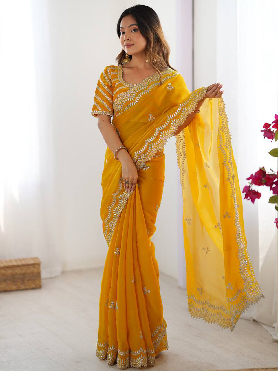 Yellow Georgette Saree with White Embroidery and Scalloped Borders