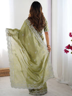 Light Green Georgette Saree with White Embroidery and Scalloped Borders
