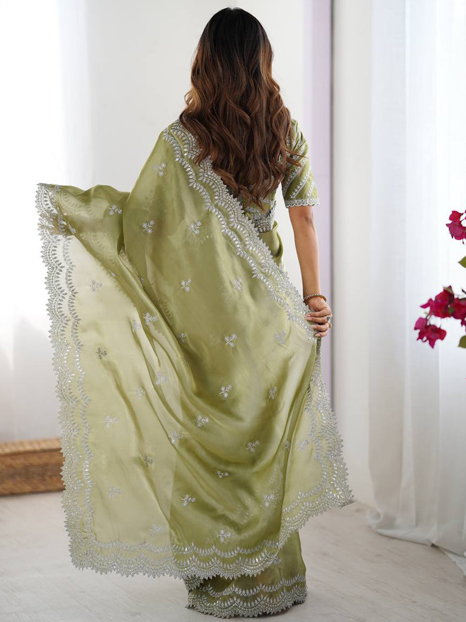 Light Green Georgette Saree with White Embroidery and Scalloped Borders