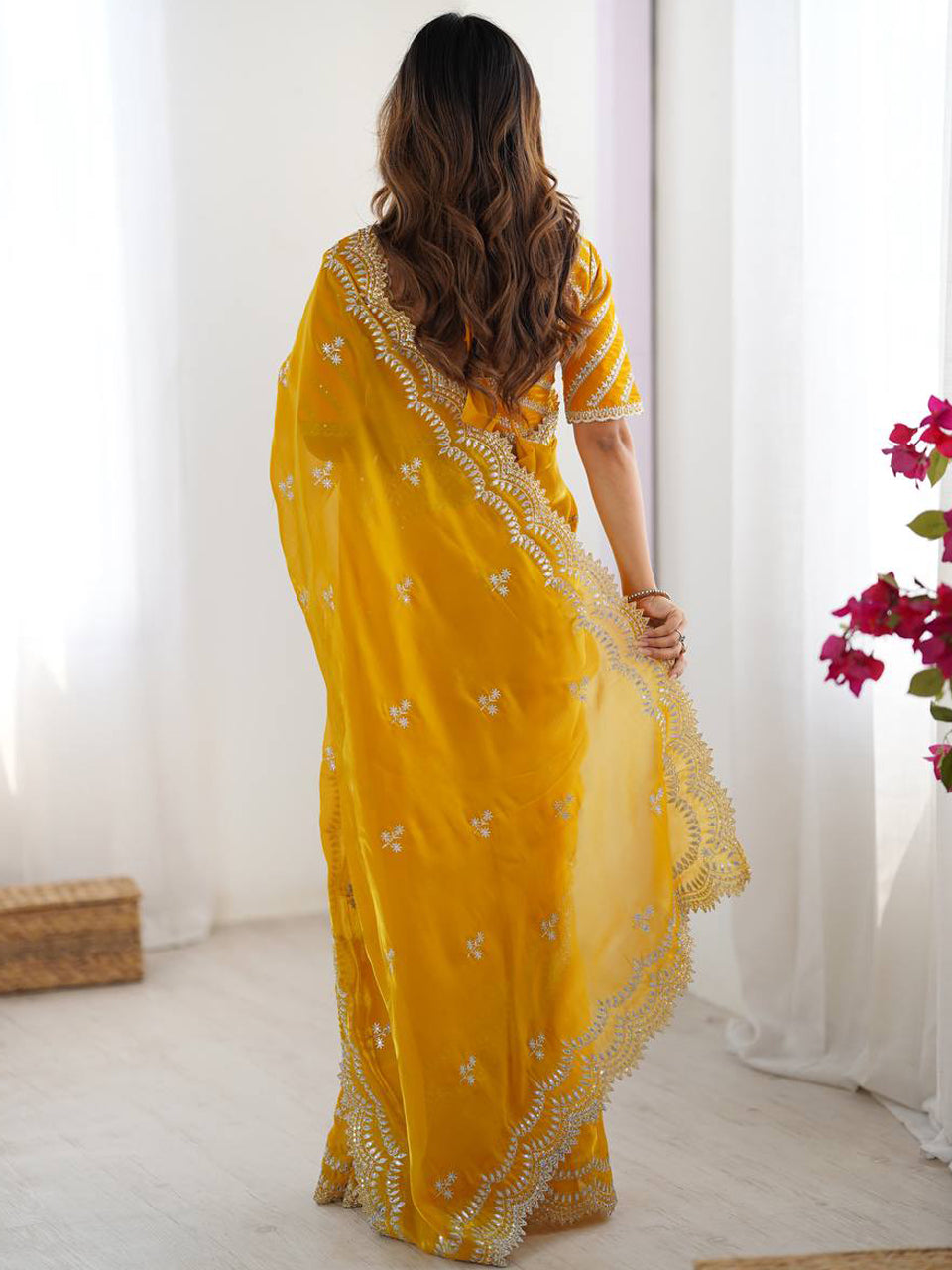 Yellow Georgette Saree with White Embroidery and Scalloped Borders