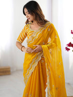 Yellow Georgette Saree with White Embroidery and Scalloped Borders
