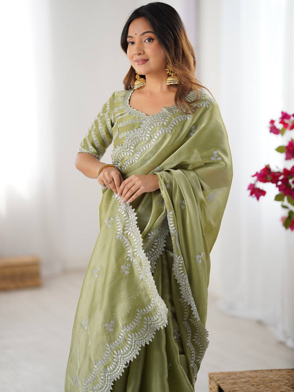 Light Green Georgette Saree with White Embroidery and Scalloped Borders