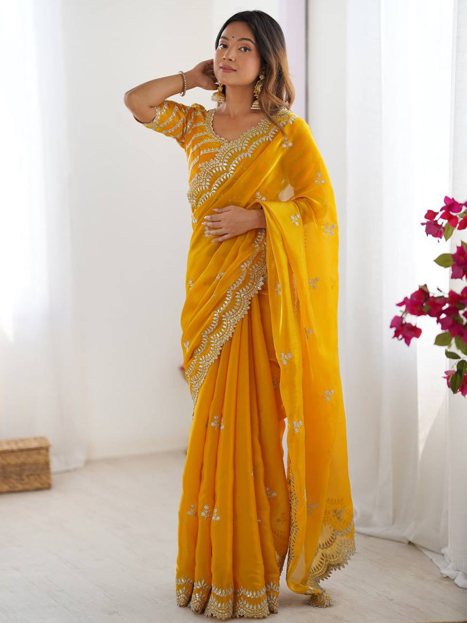 Yellow Georgette Saree with White Embroidery and Scalloped Borders