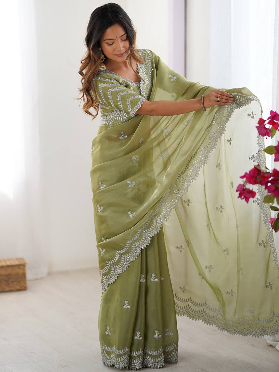 Light Green Georgette Saree with White Embroidery and Scalloped Borders