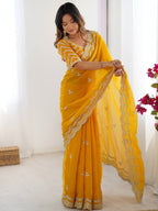 Yellow Georgette Saree with White Embroidery and Scalloped Borders