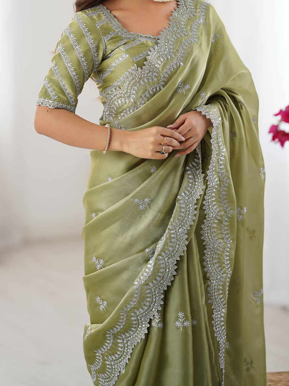 Light Green Georgette Saree with White Embroidery and Scalloped Borders