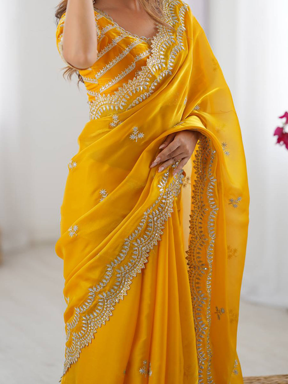 Yellow Georgette Saree with White Embroidery and Scalloped Borders