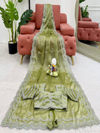 Light Green Georgette Saree with White Embroidery and Scalloped Borders