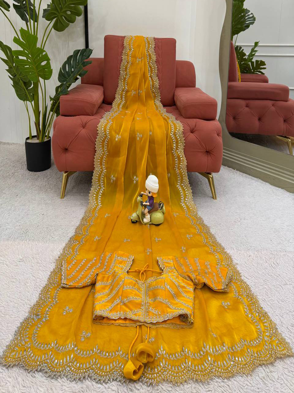Yellow Georgette Saree with White Embroidery and Scalloped Borders