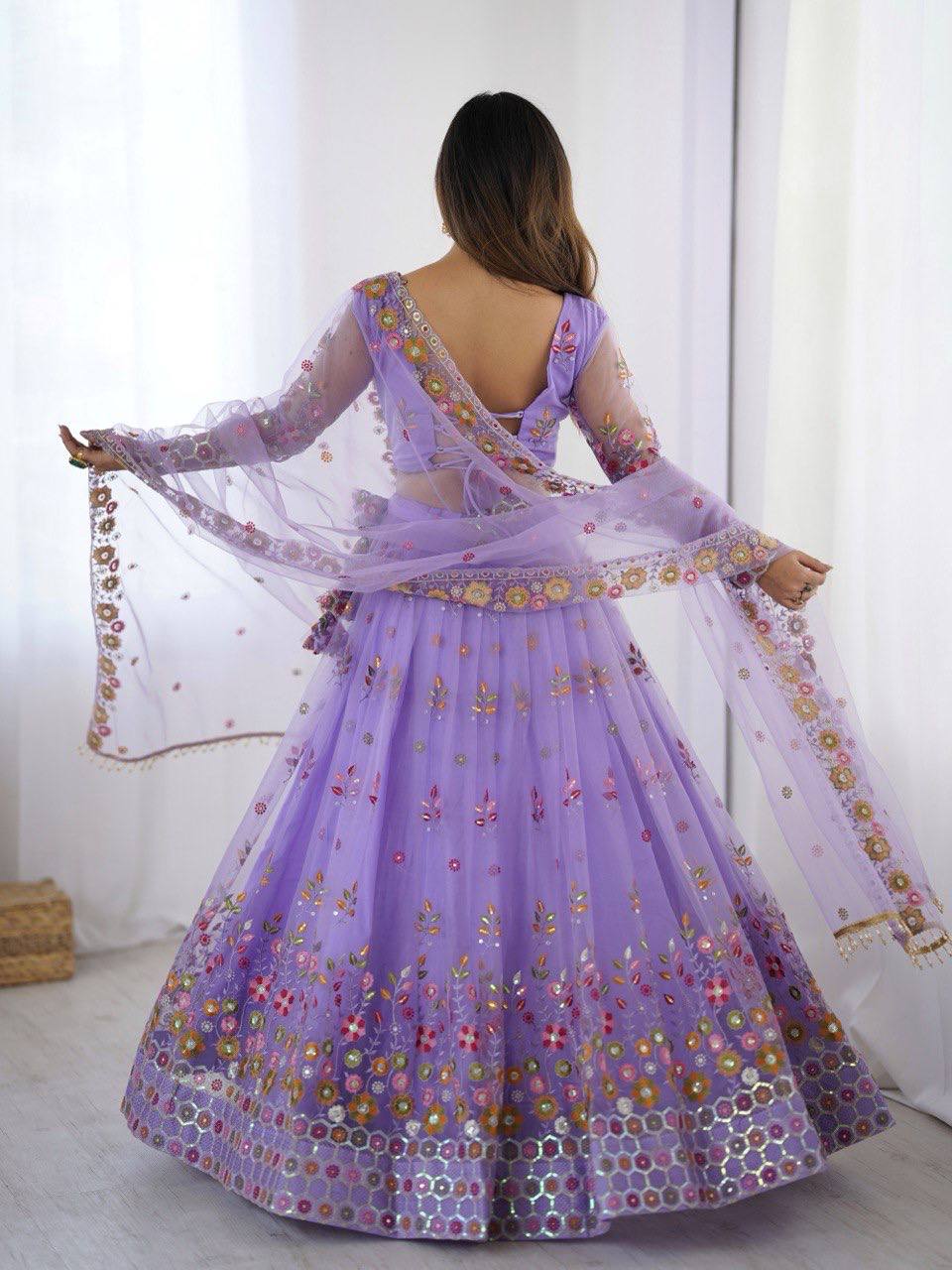 Lavender Semi-Stitched Embroidered Net Lehenga Choli Set – Timeless Beauty in Every Thread