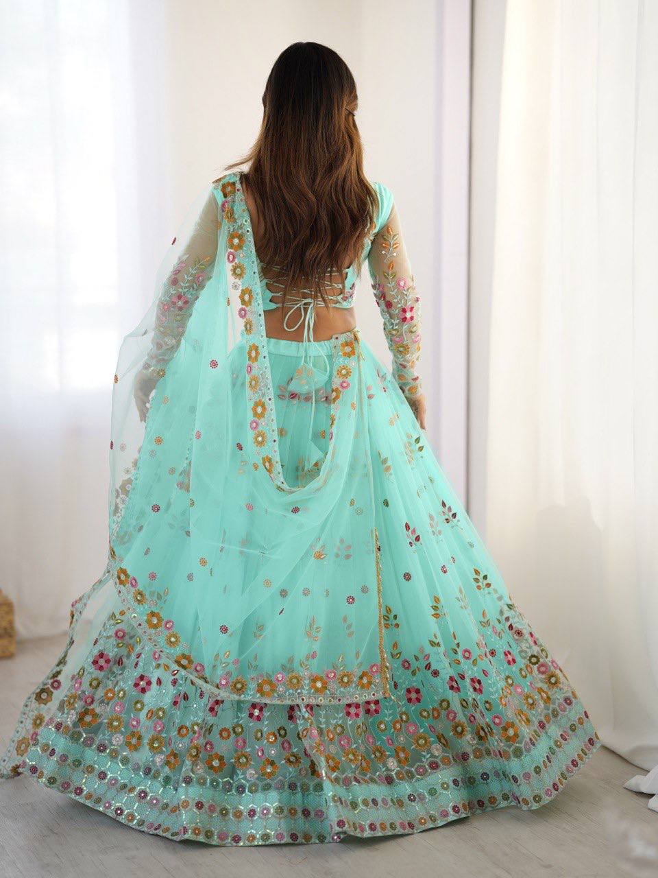 Pista Semi-Stitched Embroidered Net Lehenga Choli Set – Timeless Beauty in Every Thread