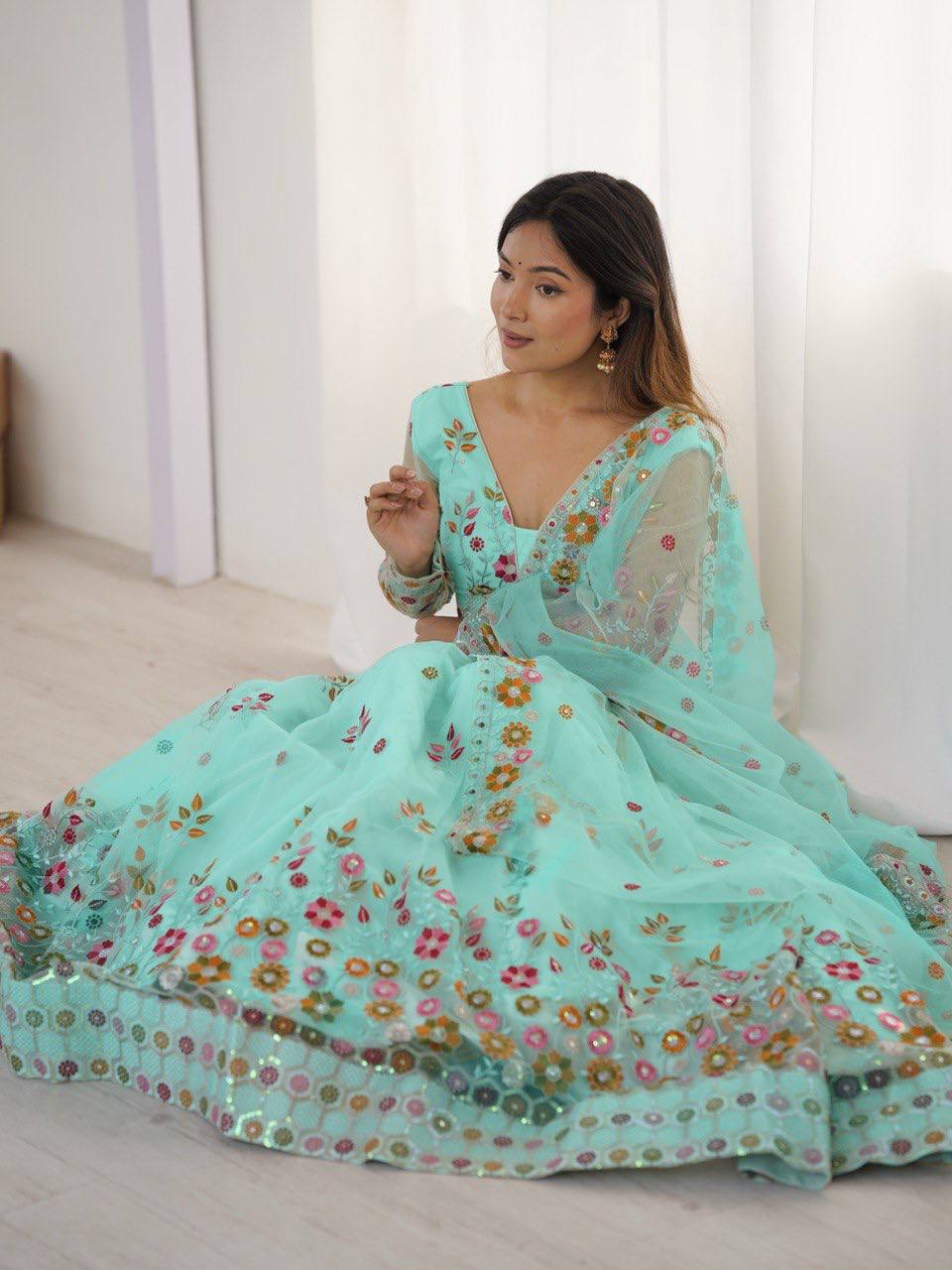 Pista Semi-Stitched Embroidered Net Lehenga Choli Set – Timeless Beauty in Every Thread