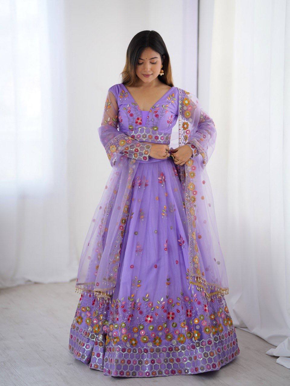 Lavender Semi-Stitched Embroidered Net Lehenga Choli Set – Timeless Beauty in Every Thread