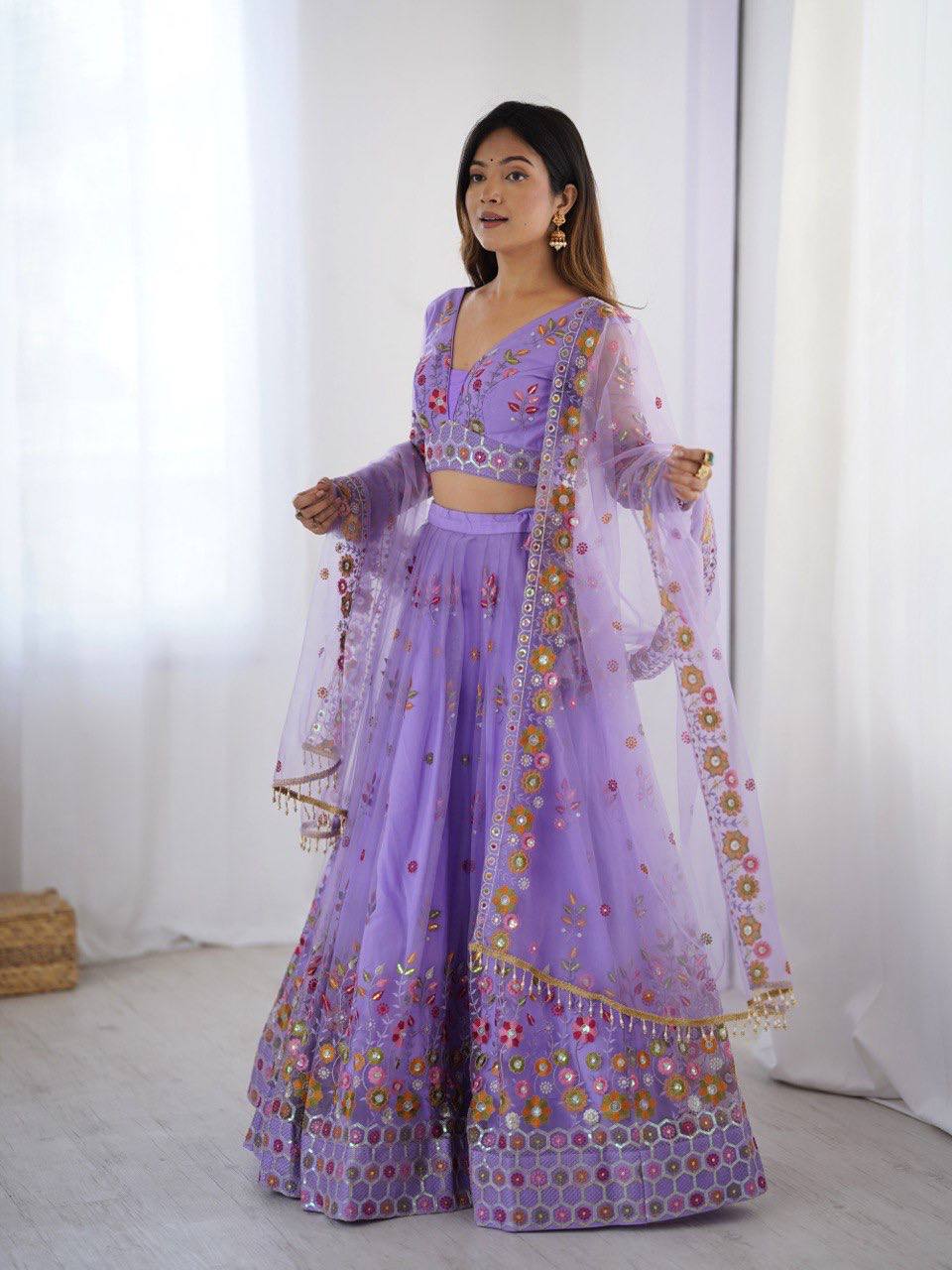 Lavender Semi-Stitched Embroidered Net Lehenga Choli Set – Timeless Beauty in Every Thread