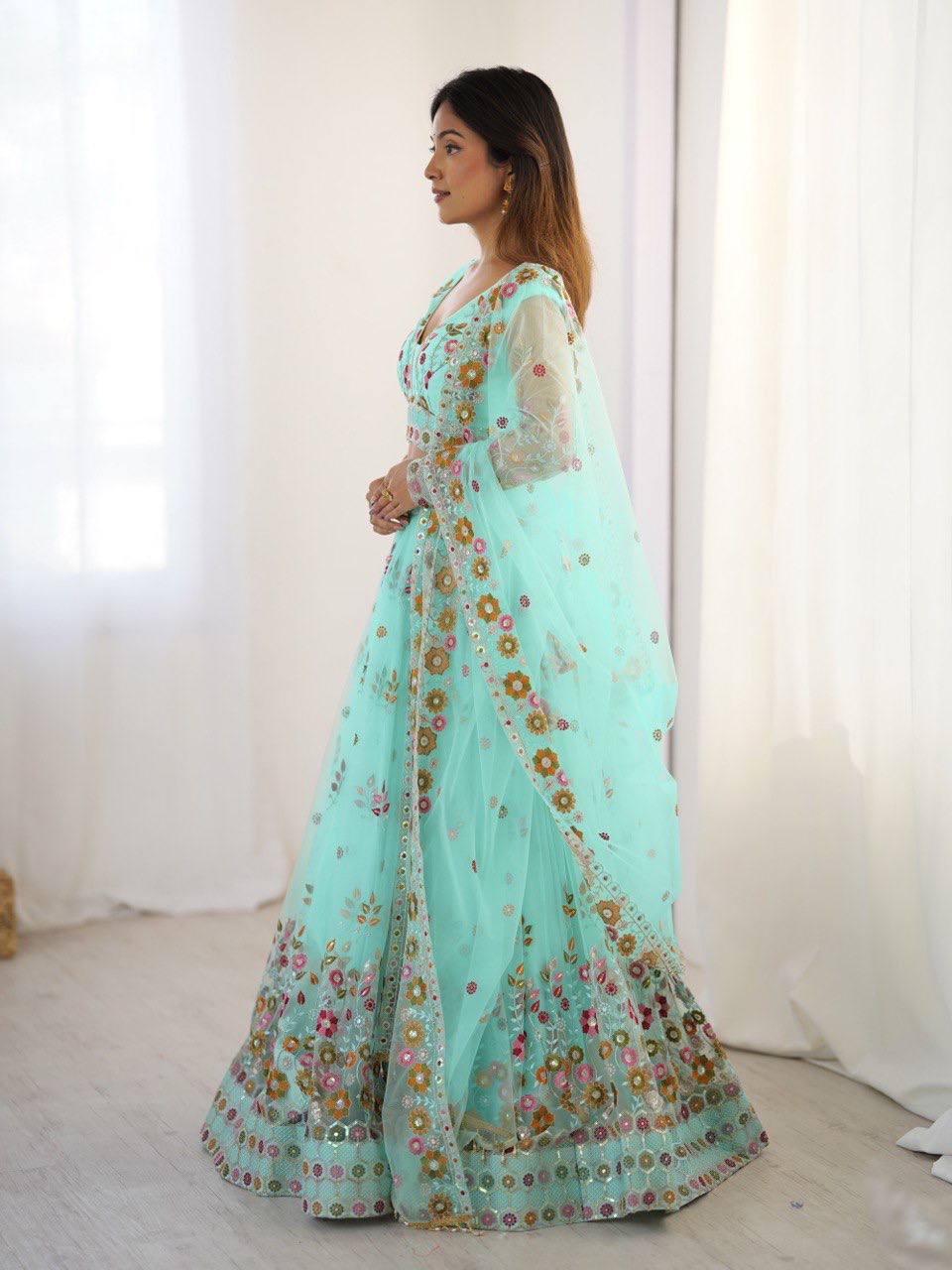 Pista Semi-Stitched Embroidered Net Lehenga Choli Set – Timeless Beauty in Every Thread