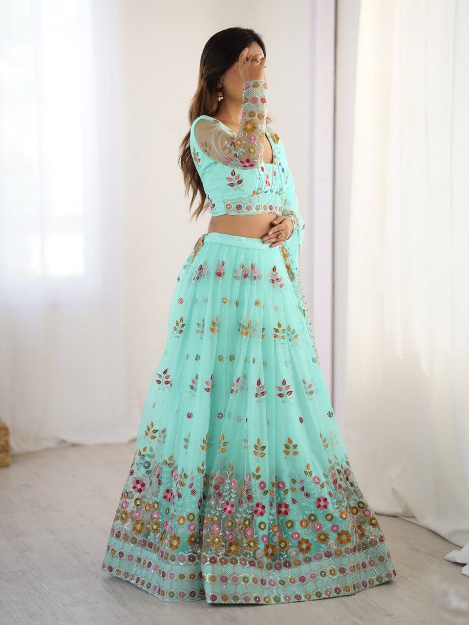 Pista Semi-Stitched Embroidered Net Lehenga Choli Set – Timeless Beauty in Every Thread