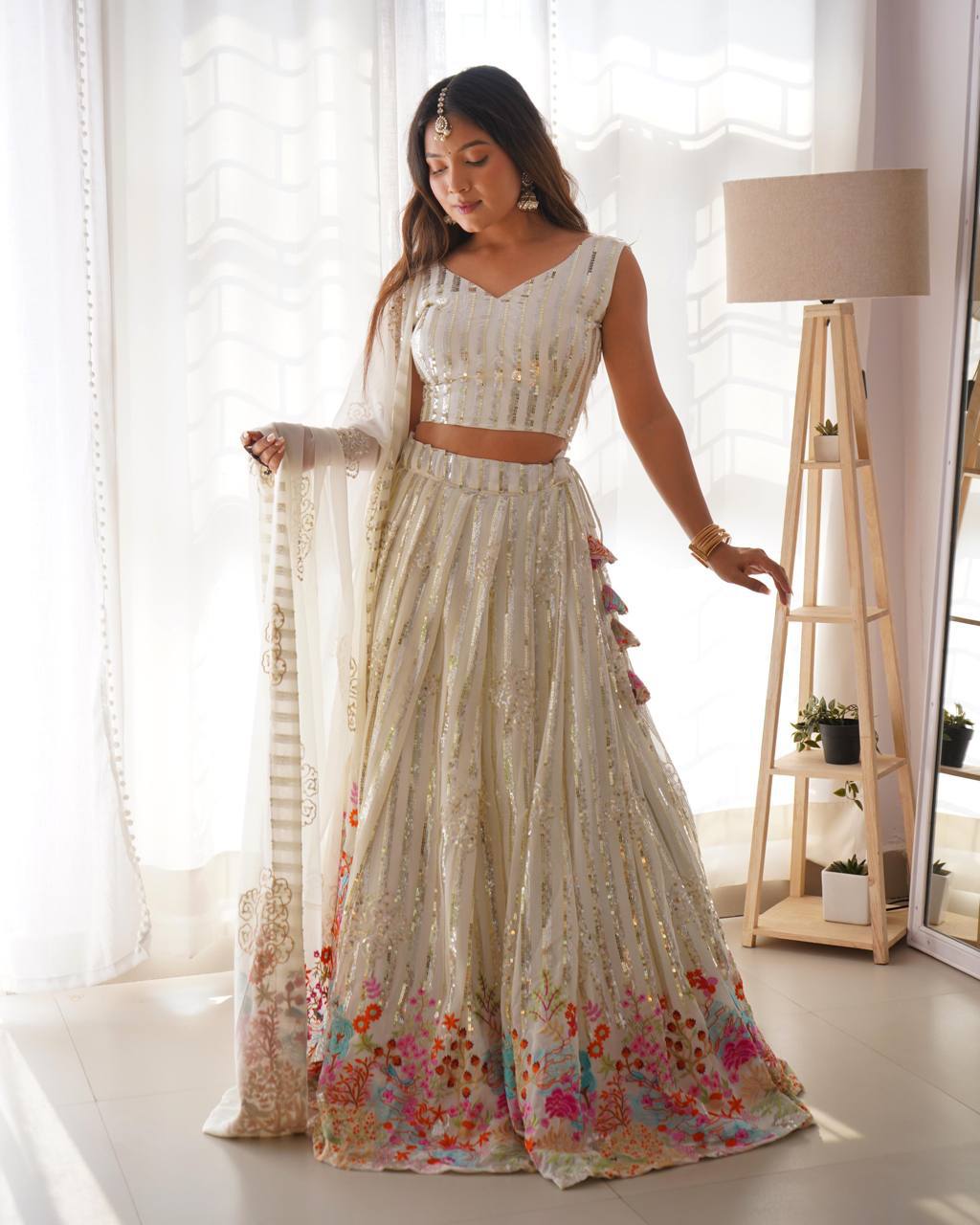White Semi-Stitched Faux Georgette Party Wear Lehenga Choli with Sequin Detailing – Elegant & Glamorous Look