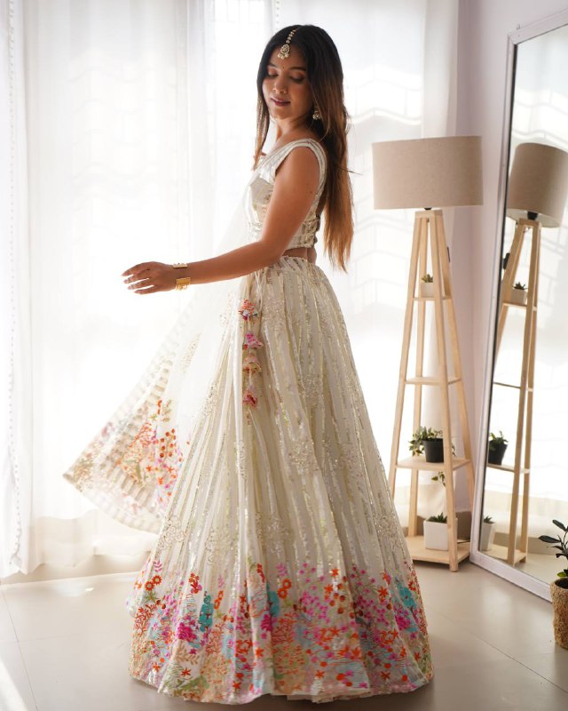 White Semi-Stitched Faux Georgette Party Wear Lehenga Choli with Sequin Detailing – Elegant & Glamorous Look