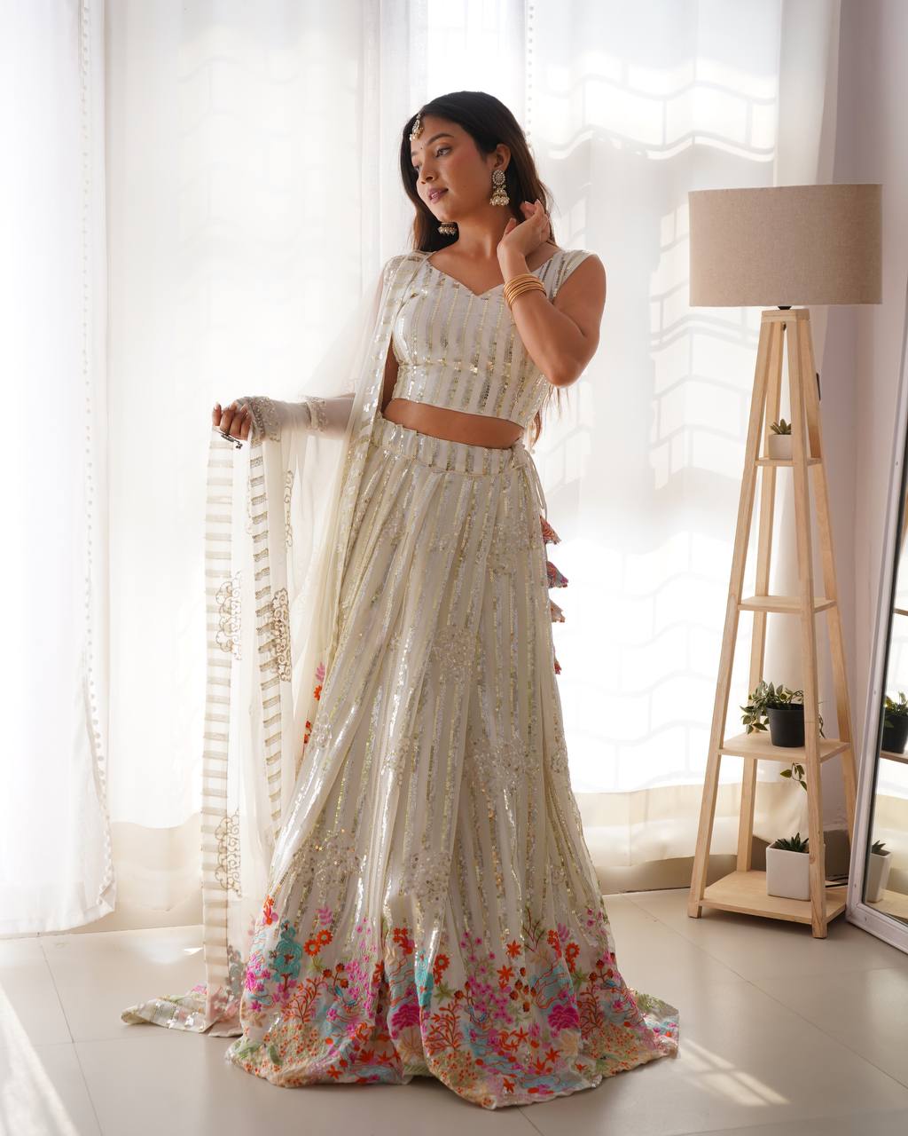 White Semi-Stitched Faux Georgette Party Wear Lehenga Choli with Sequin Detailing – Elegant & Glamorous Look