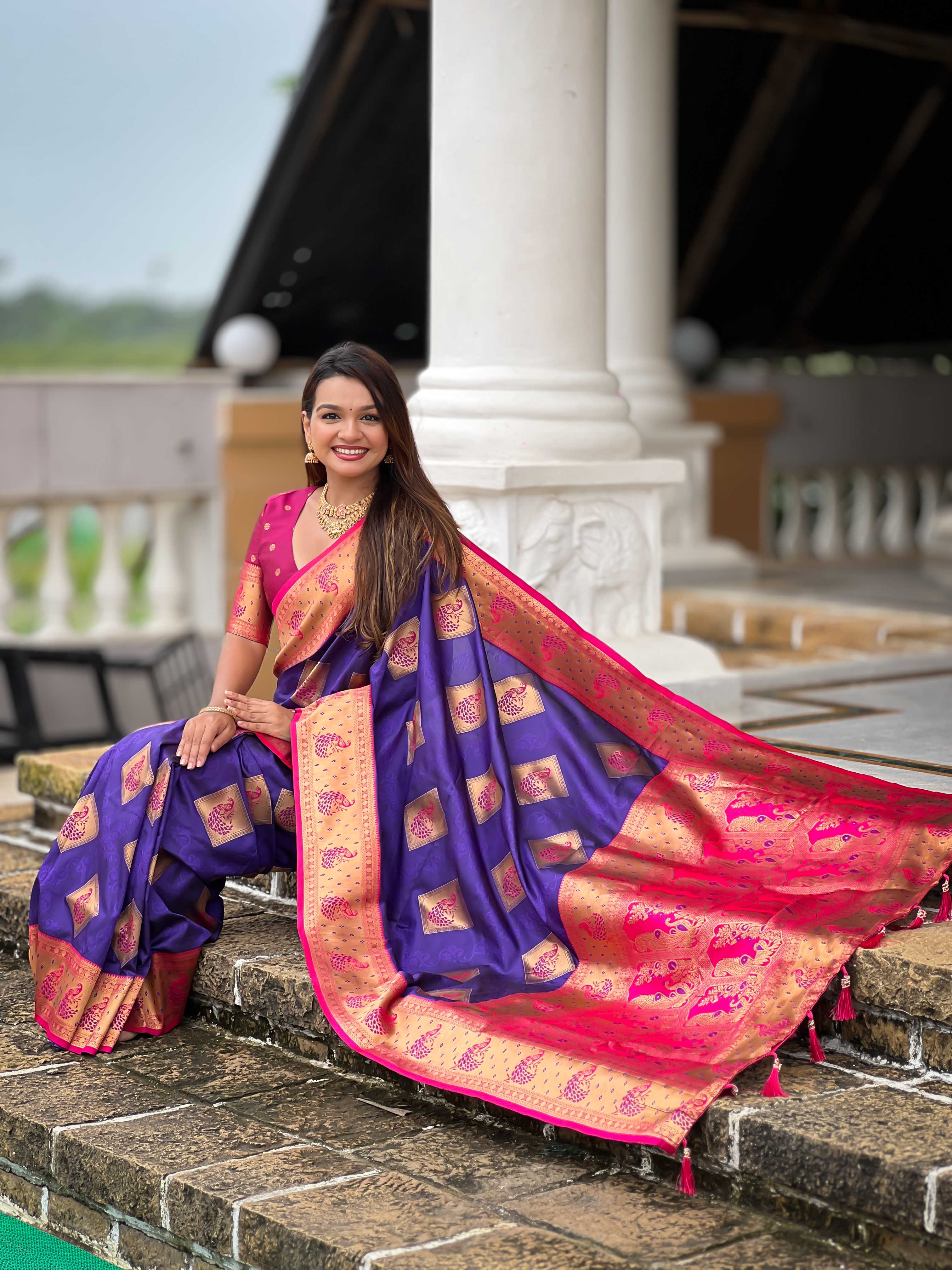 Violet Soft Banarasi silk saree with zari weaving Meenakari design all over the saree & contrast weawing Rich pallu with contrast weawing border & tessels attached at Pallu End. Blouse :- Soft silk weawing blouse piece
