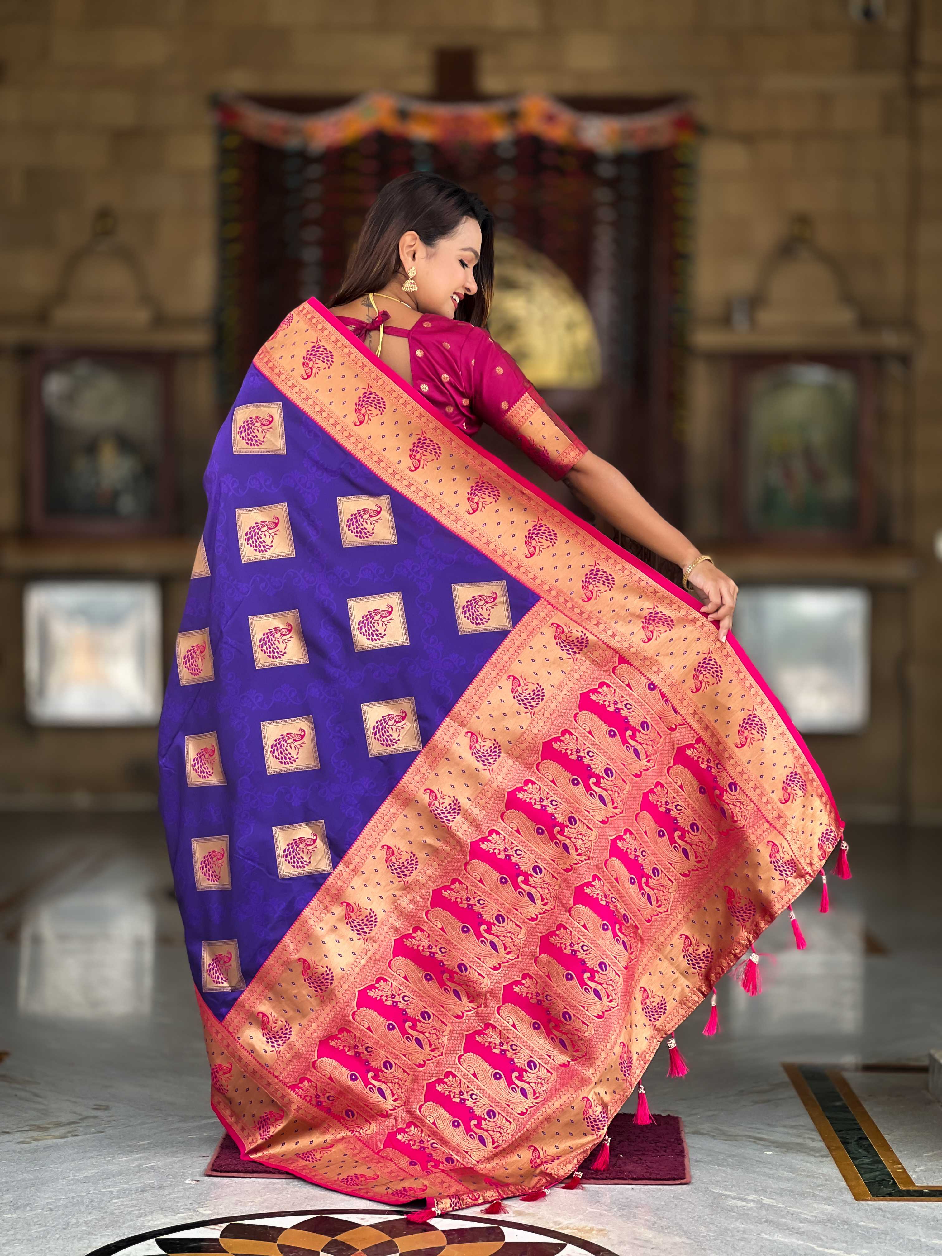 Violet Soft Banarasi silk saree with zari weaving Meenakari design all over the saree & contrast weawing Rich pallu with contrast weawing border & tessels attached at Pallu End. Blouse :- Soft silk weawing blouse piece