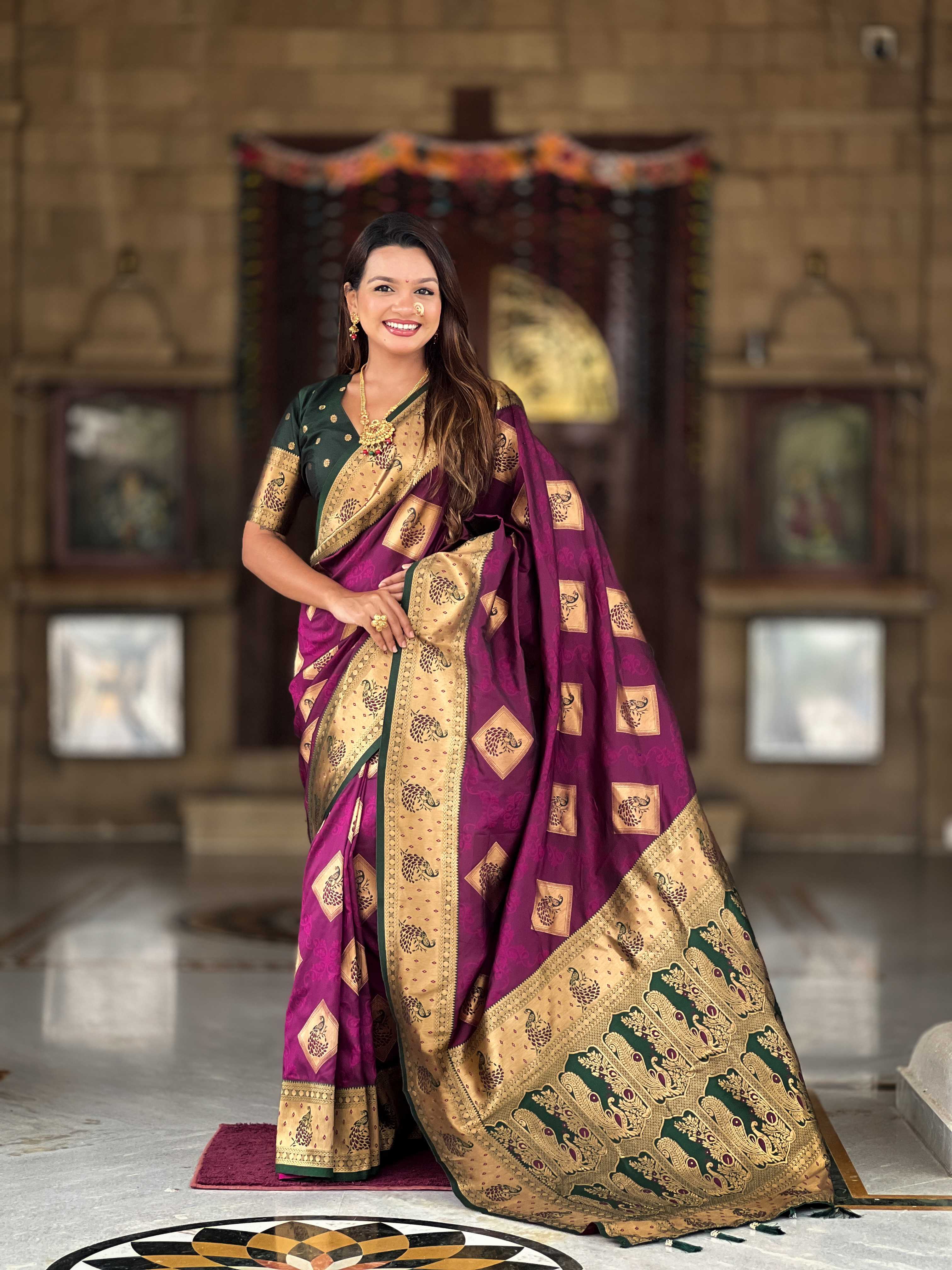 Wine Soft Banarasi silk saree with zari weaving Meenakari design all over the saree & contrast weawing Rich pallu with contrast weawing border & tessels attached at Pallu End. Blouse :- Soft silk weawing blouse piece