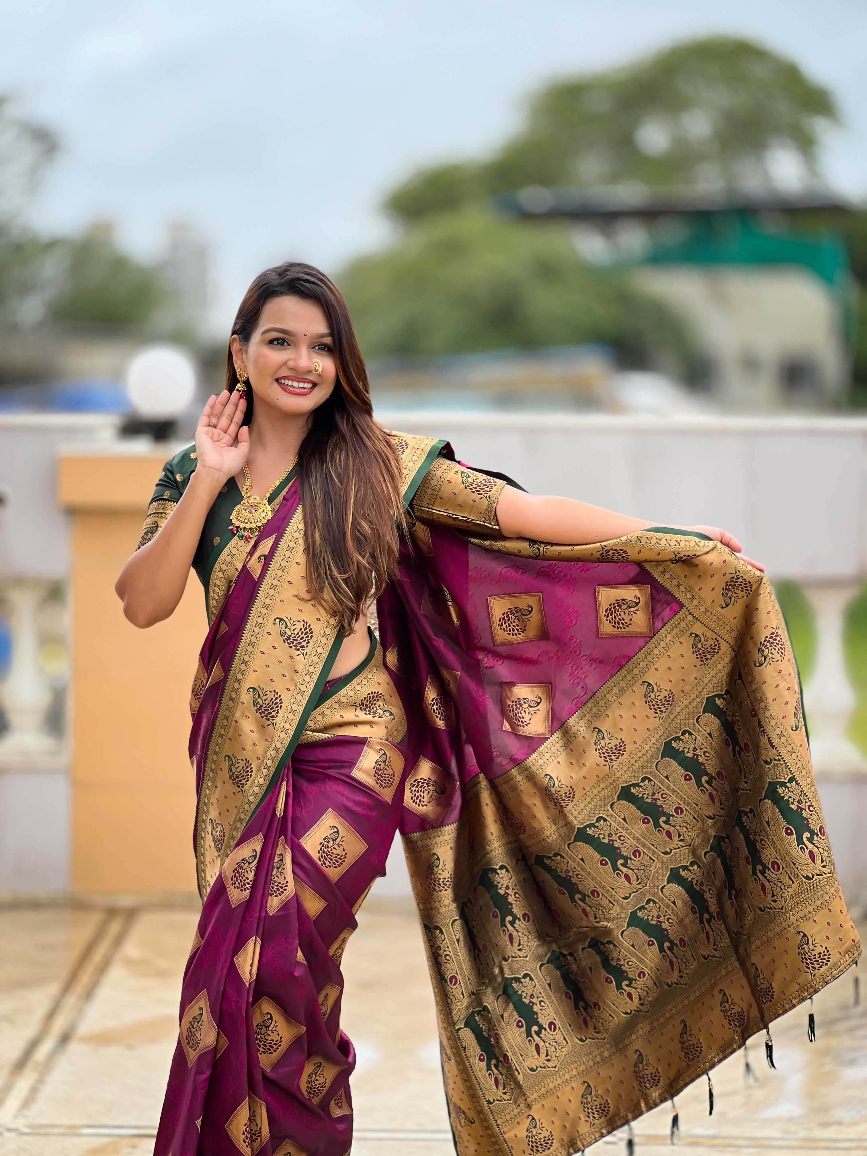 Wine Soft Banarasi silk saree with zari weaving Meenakari design all over the saree & contrast weawing Rich pallu with contrast weawing border & tessels attached at Pallu End. Blouse :- Soft silk weawing blouse piece